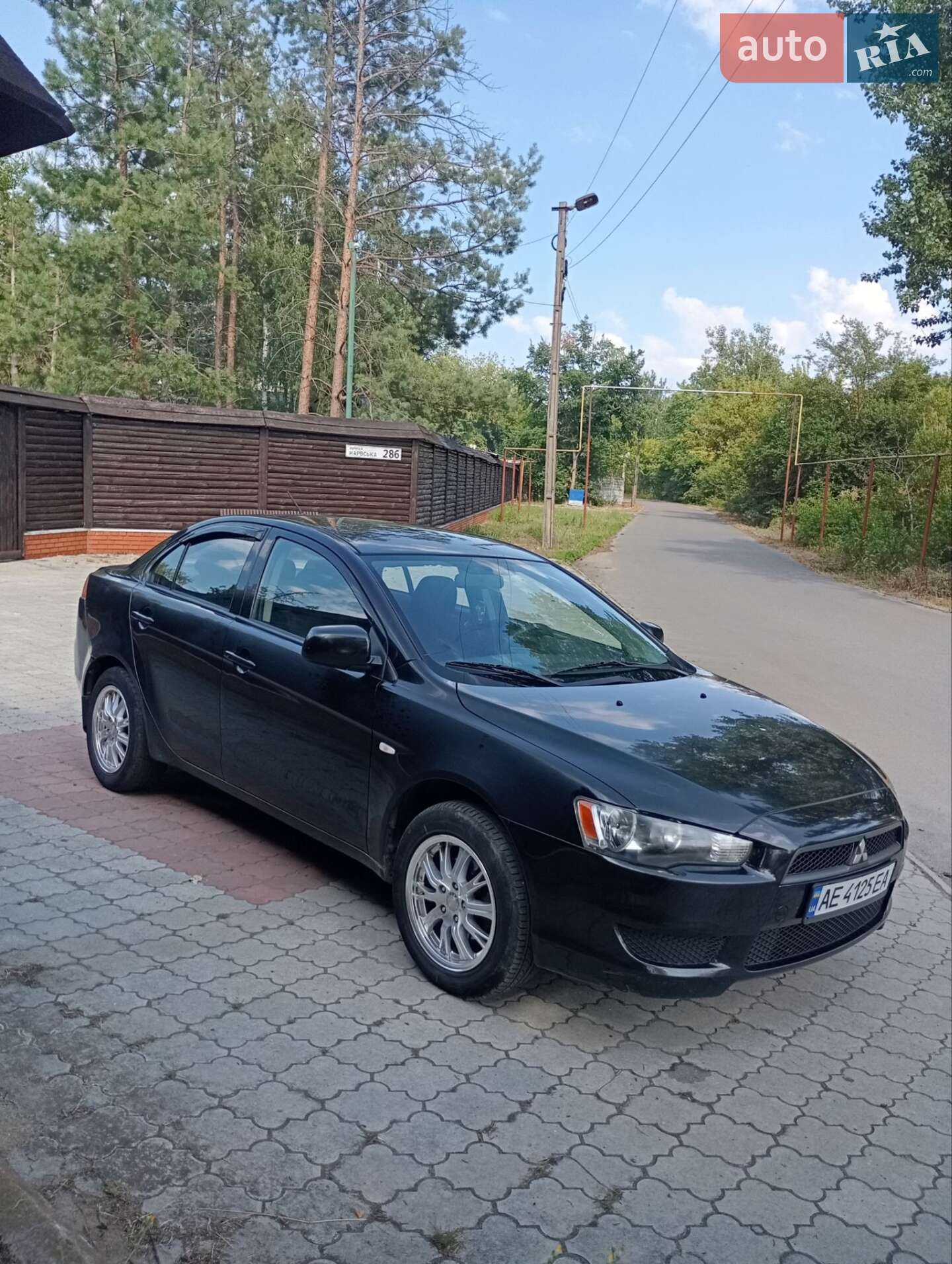 Головне фото звіту автомобіля MITSUBISHI LANCER 2009
