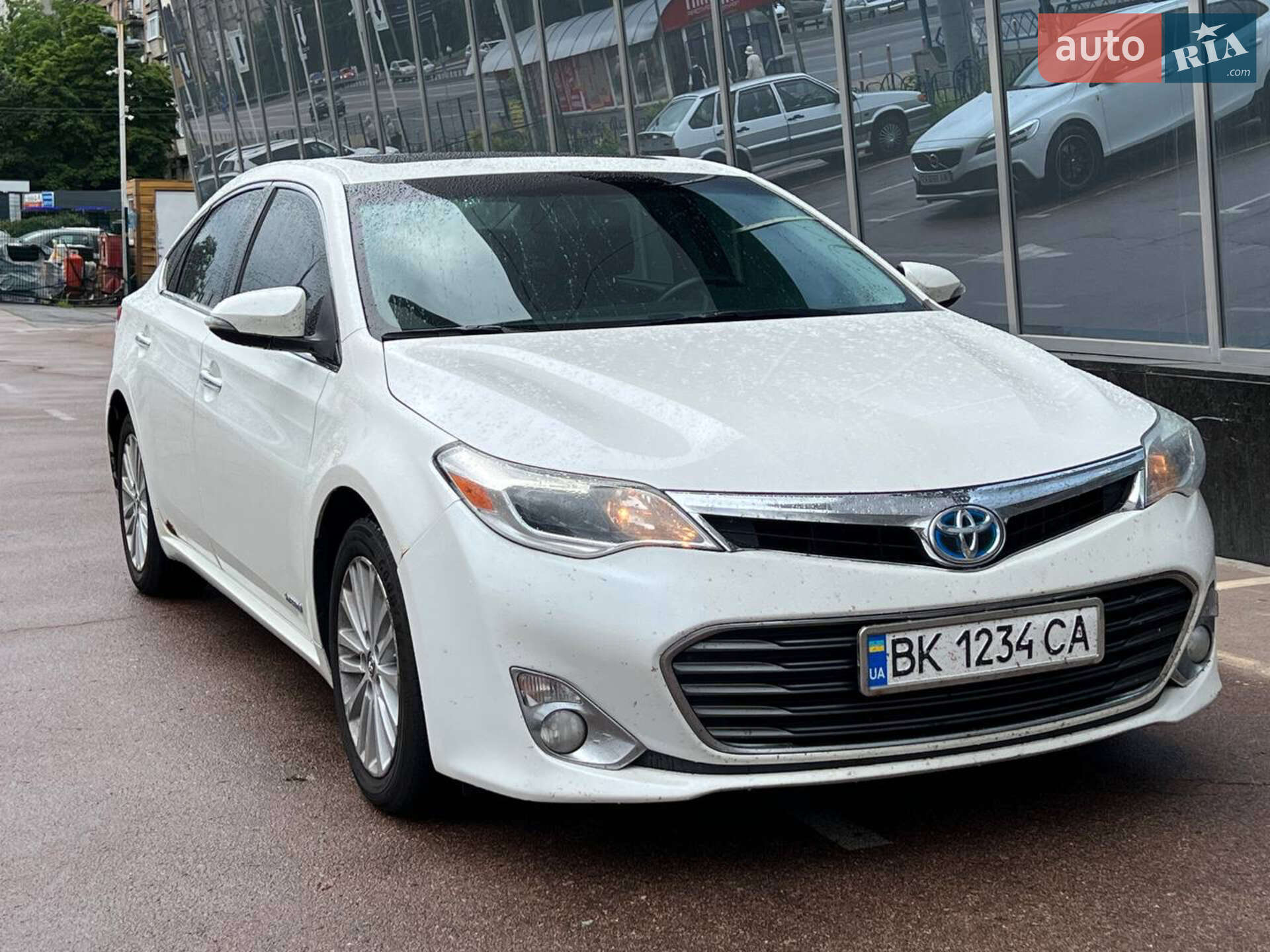 Головне фото звіту автомобіля TOYOTA AVALON 2013