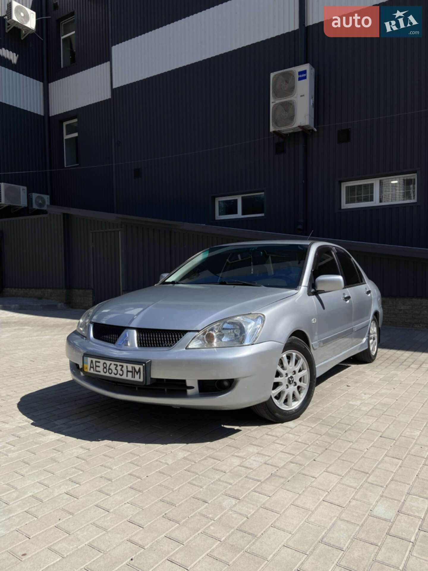 Головне фото звіту автомобіля MITSUBISHI LANCER 2006