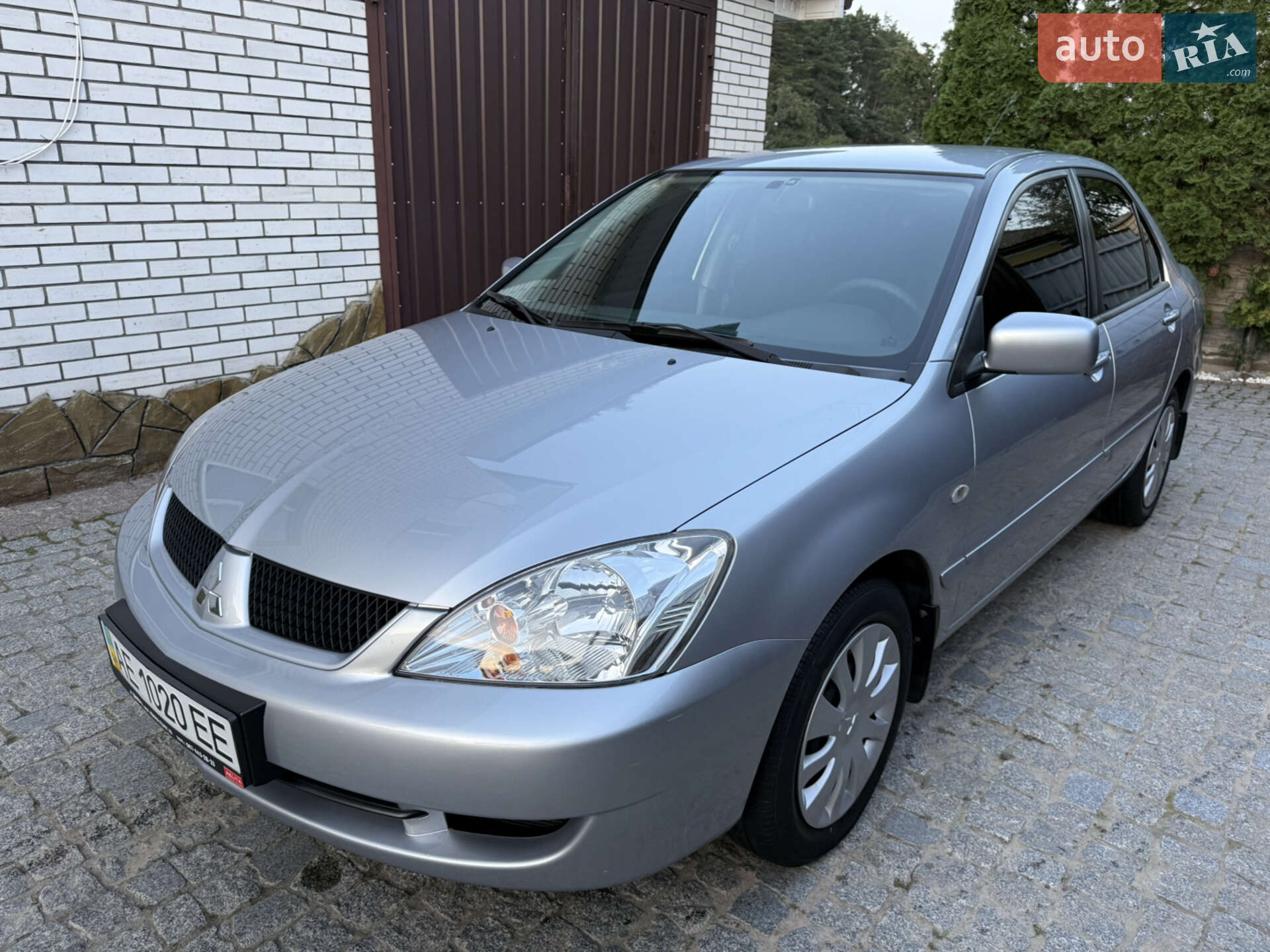Головне фото звіту автомобіля MITSUBISHI LANCER 2010
