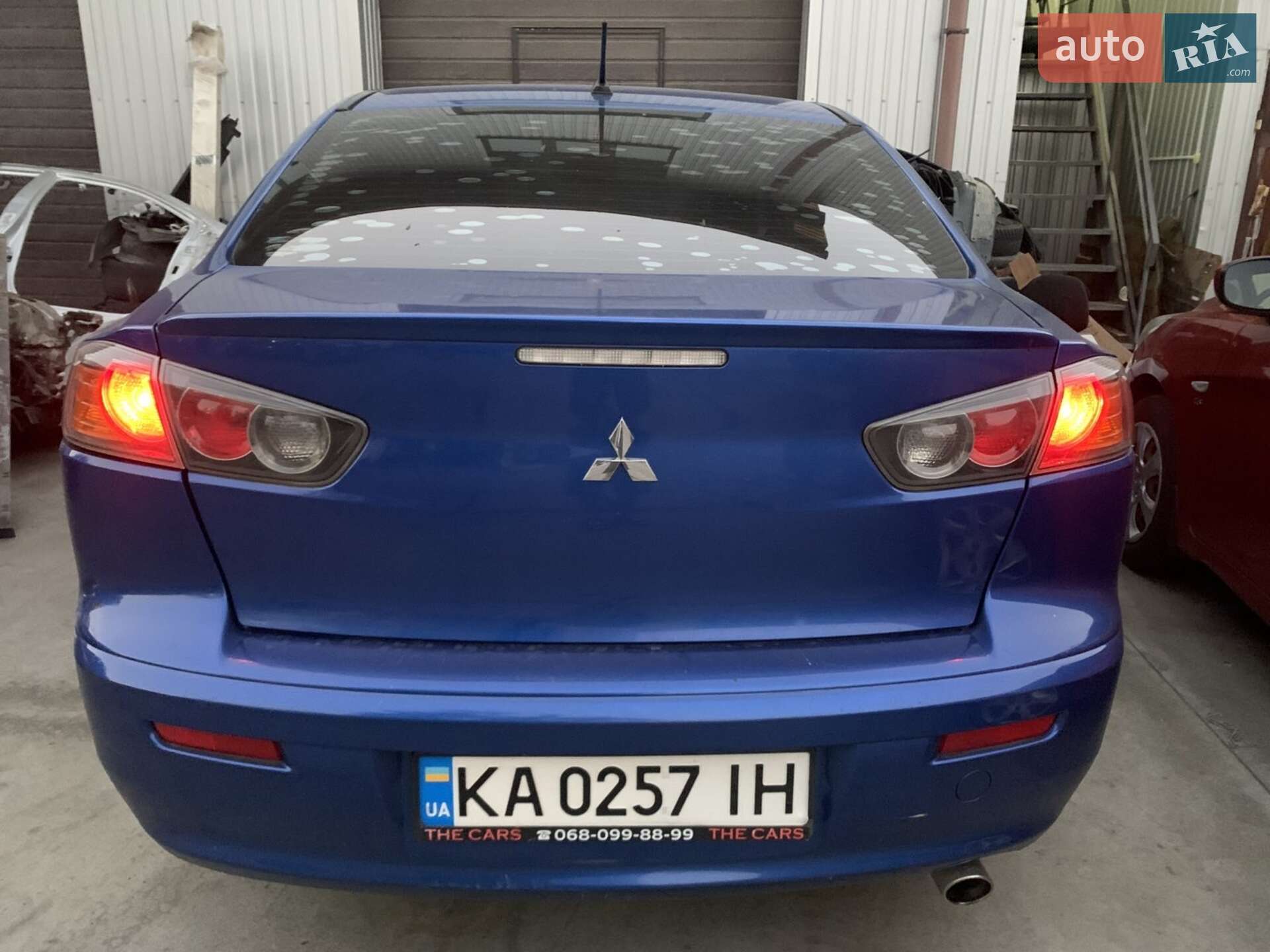 Головне фото звіту автомобіля MITSUBISHI LANCER 2014