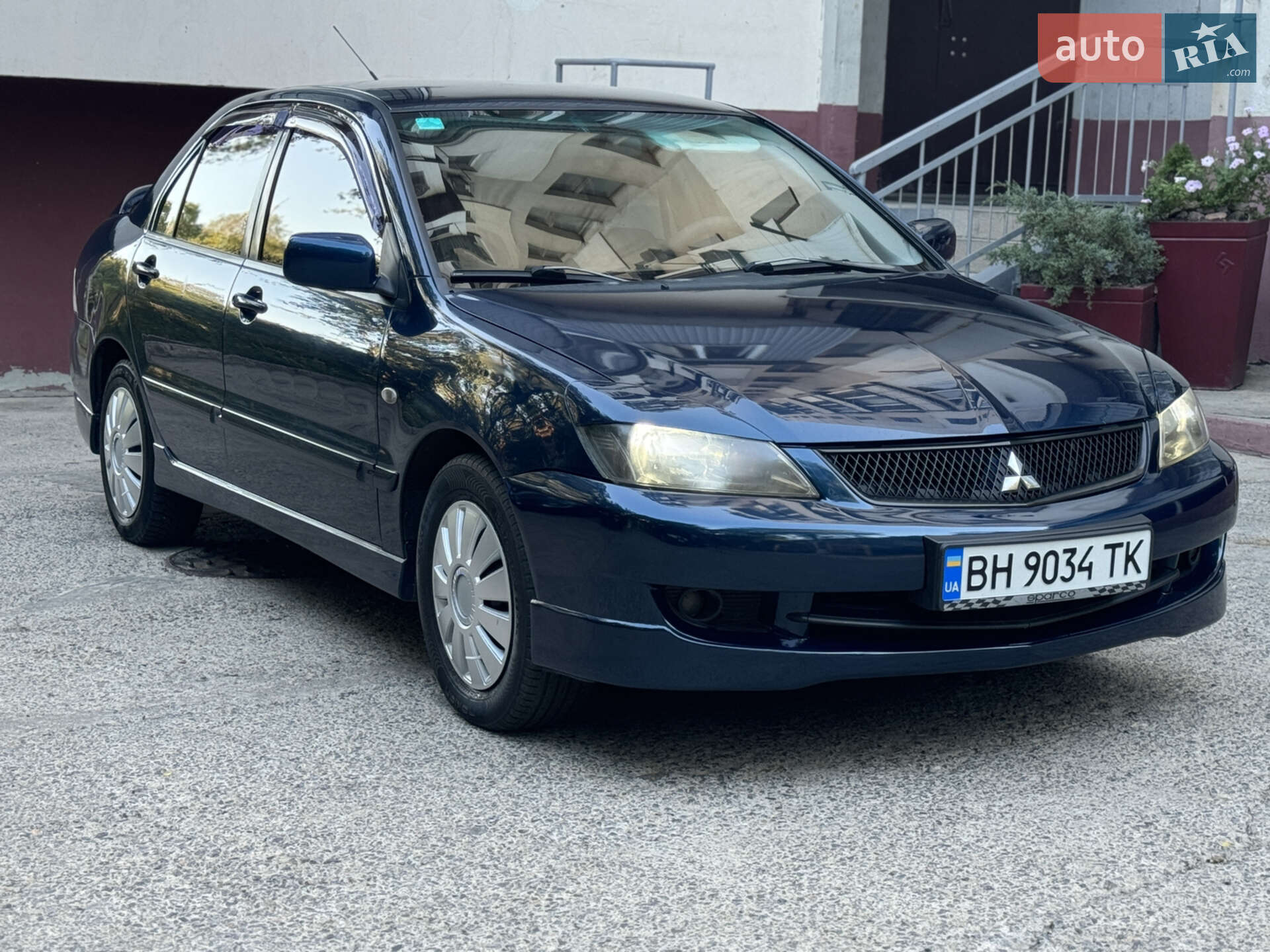 Головне фото звіту автомобіля MITSUBISHI LANCER 2007