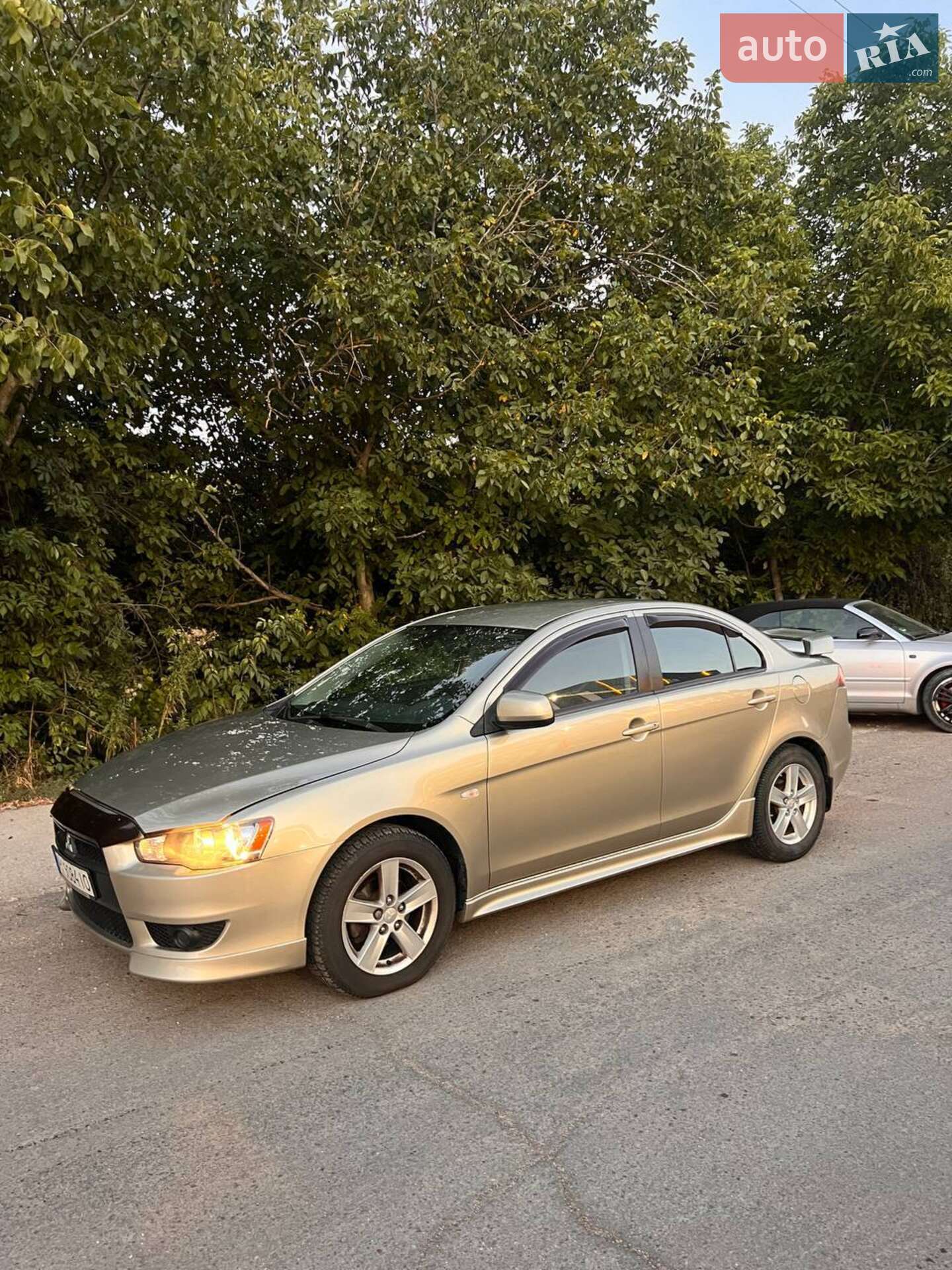 Головне фото звіту автомобіля MITSUBISHI LANCER 2008