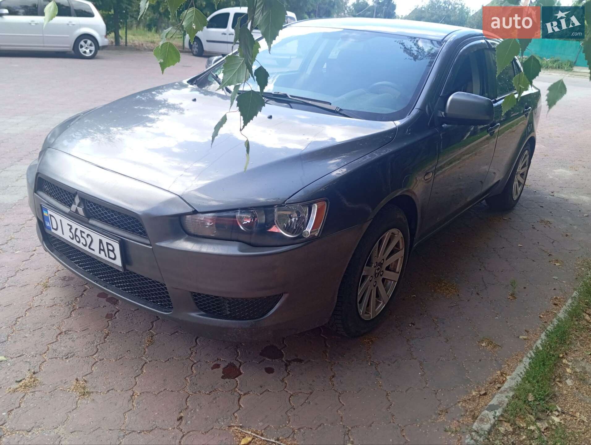 Головне фото звіту автомобіля MITSUBISHI LANCER 2009