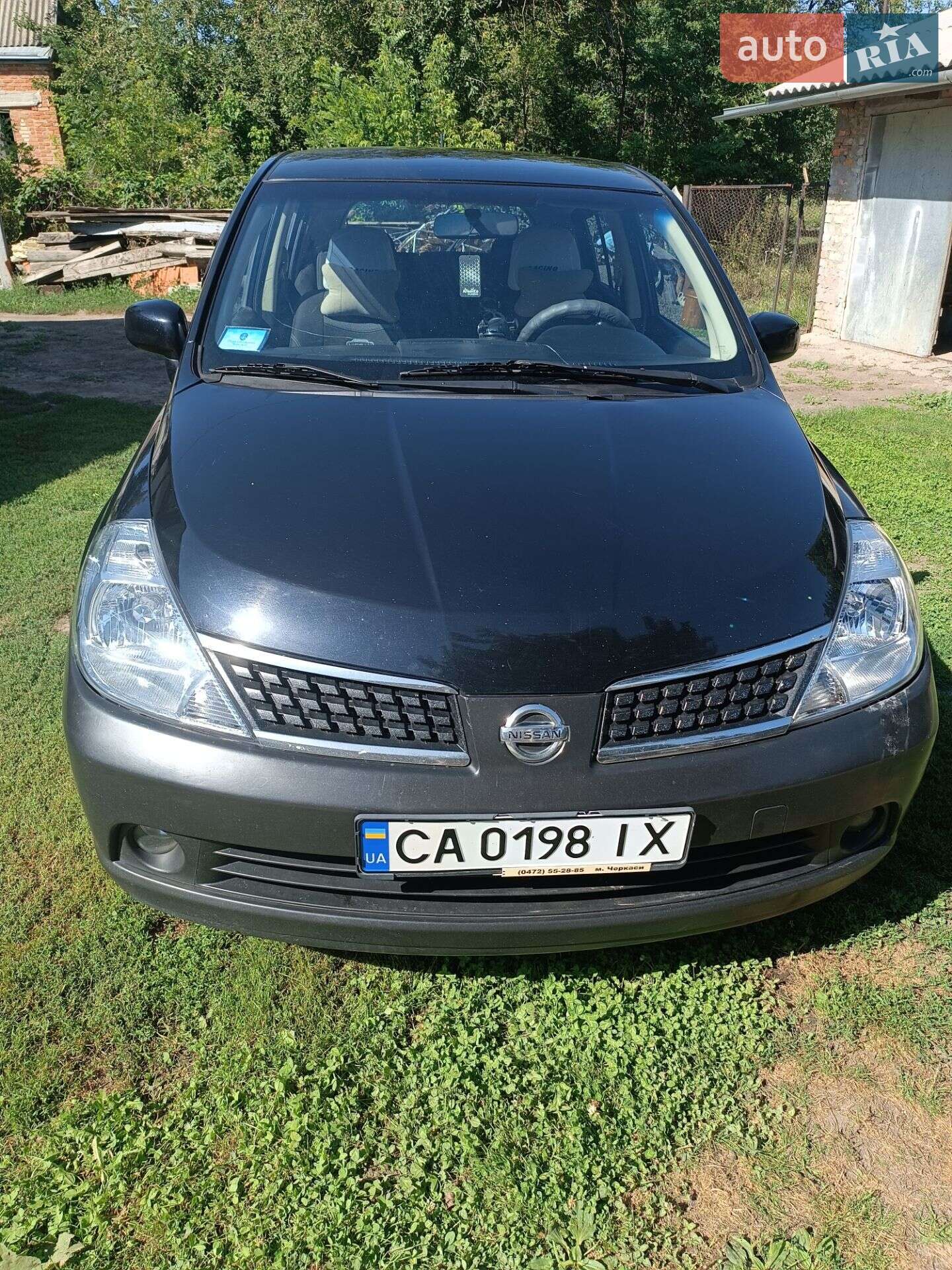 Головне фото звіту автомобіля NISSAN TIIDA 2008