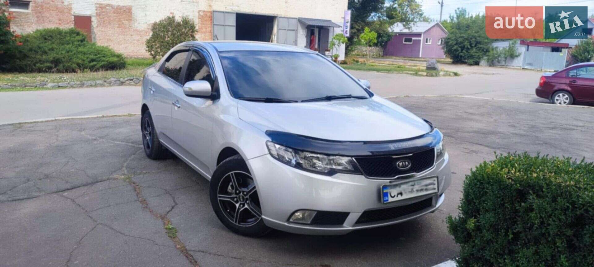 Головне фото звіту автомобіля KIA CERATO 2009