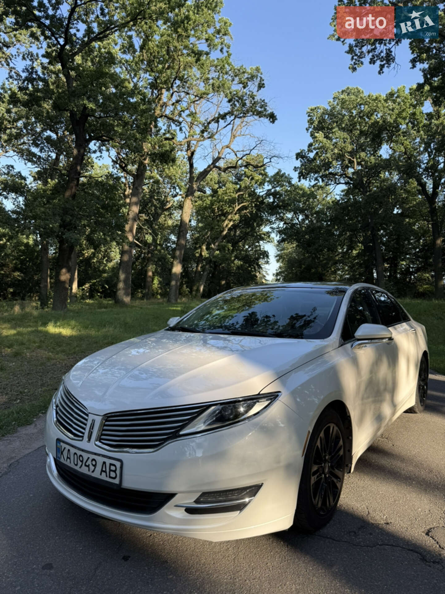 Головне фото звіту автомобіля LINCOLN MKZ 2014