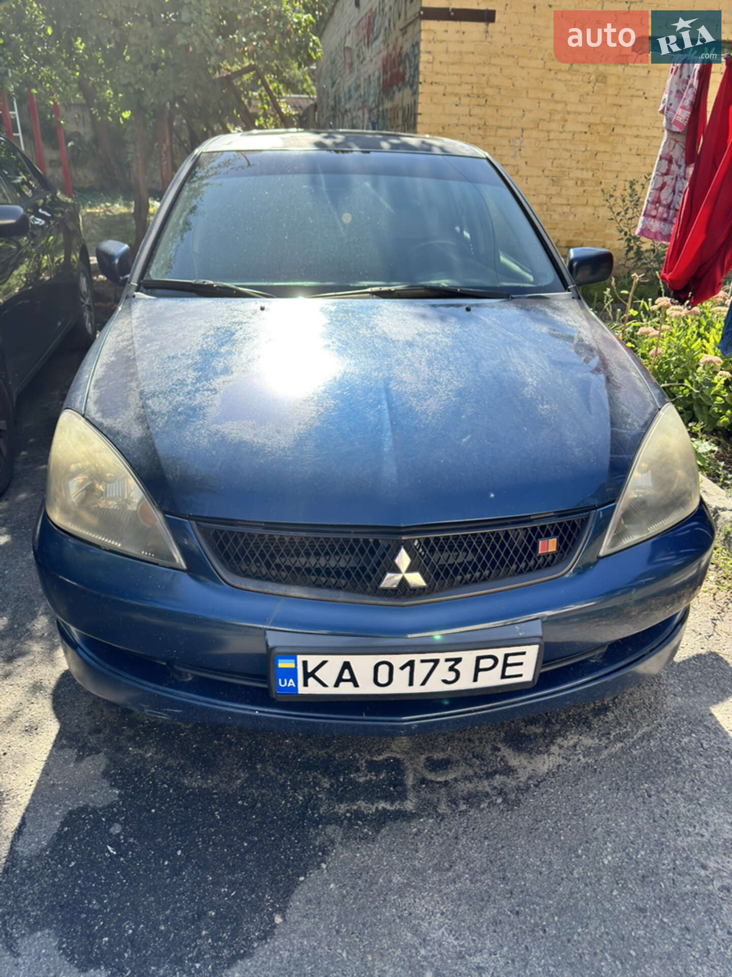 Головне фото звіту автомобіля MITSUBISHI LANCER 2006
