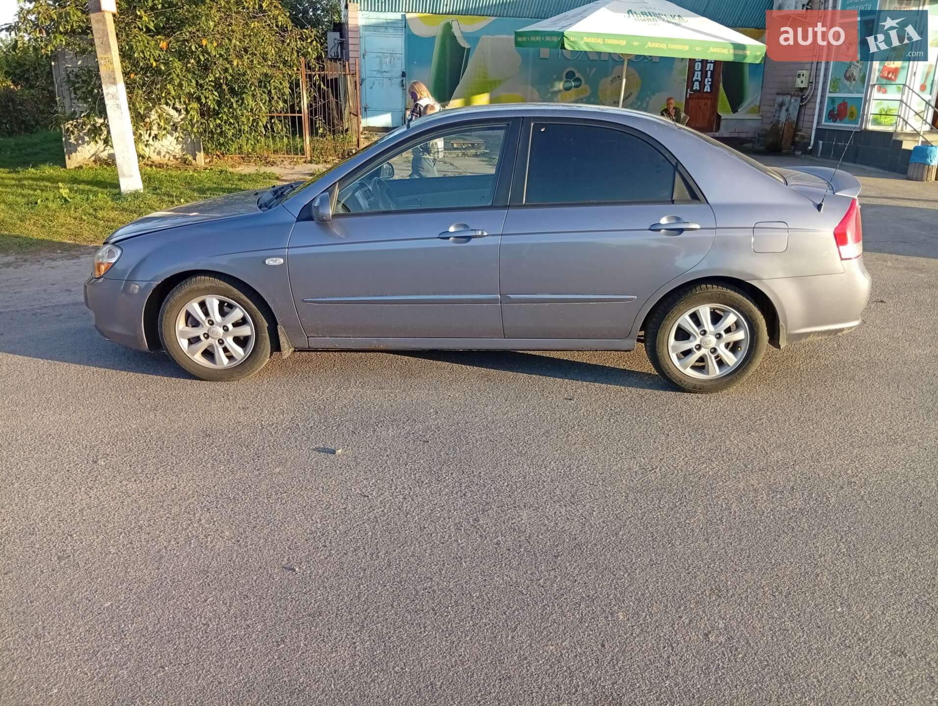 Головне фото звіту автомобіля KIA CERATO 2009