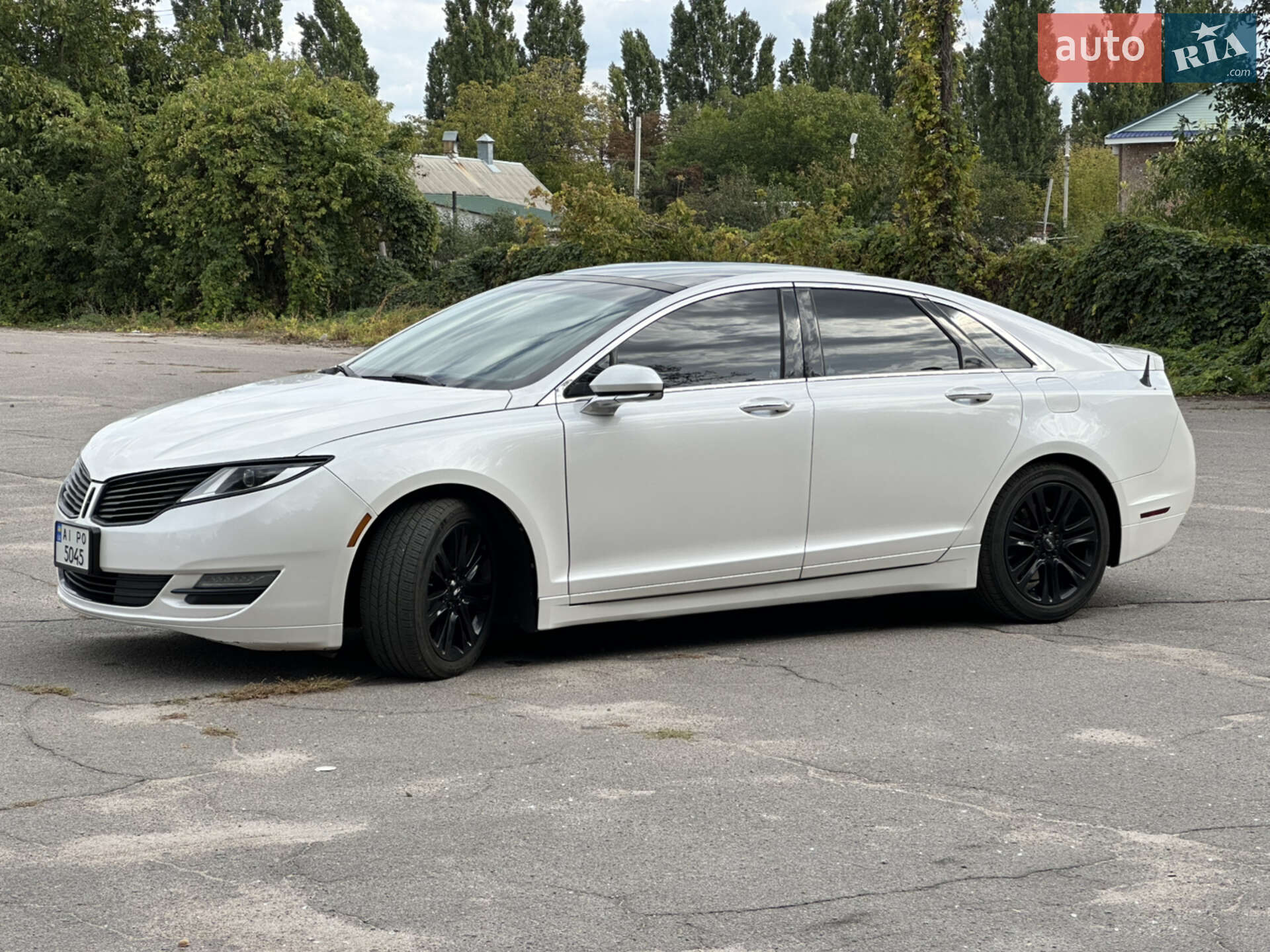 Головне фото звіту автомобіля LINCOLN MKZ 2012