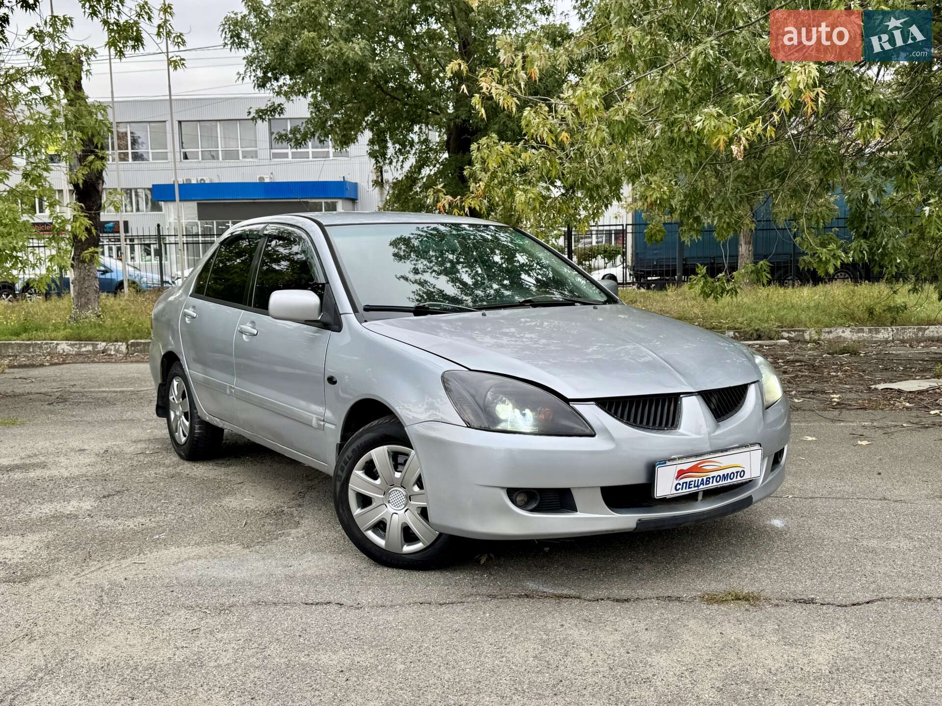 Головне фото звіту автомобіля MITSUBISHI LANCER 2005