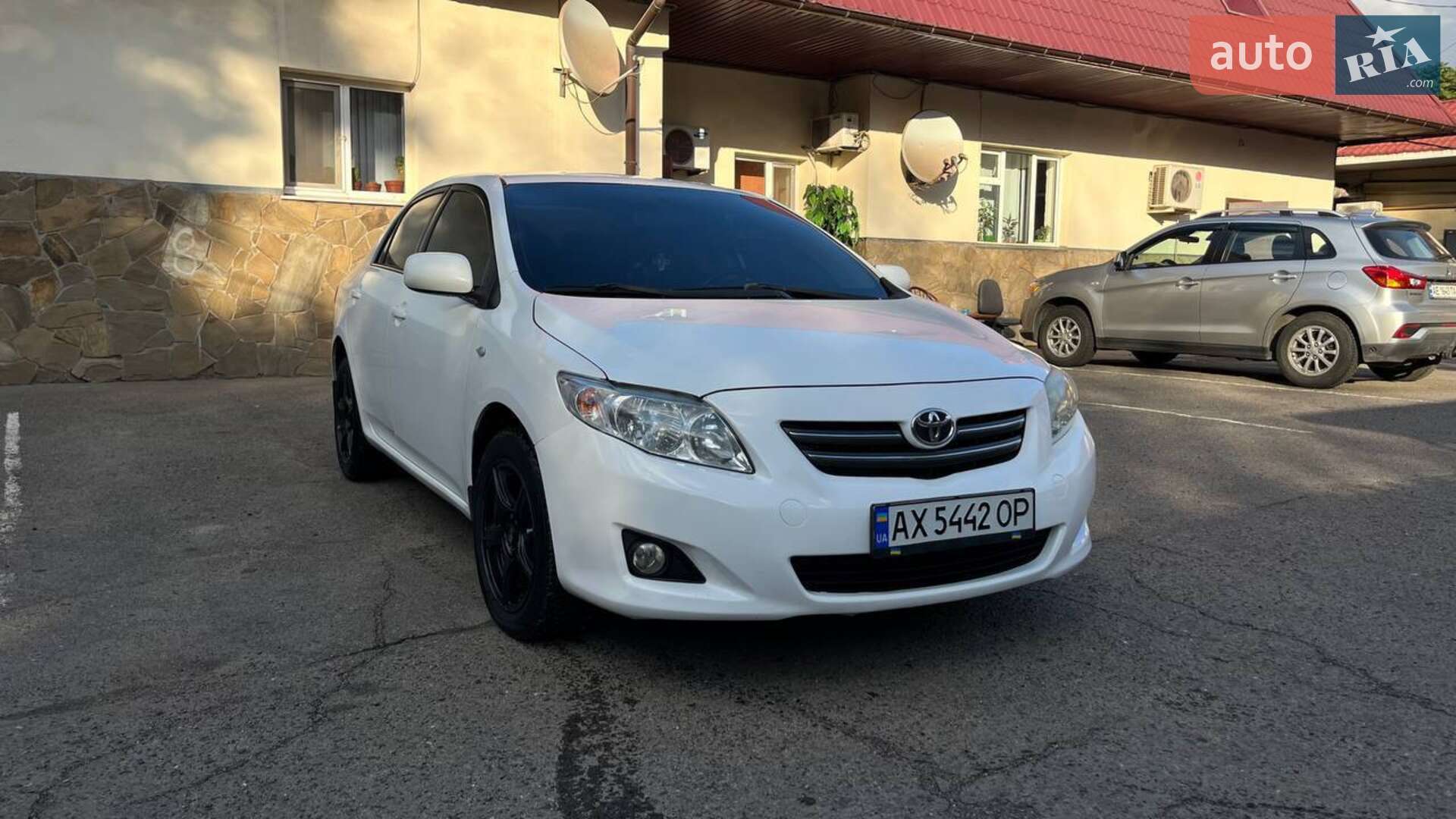 Головне фото звіту автомобіля TOYOTA COROLLA 2008
