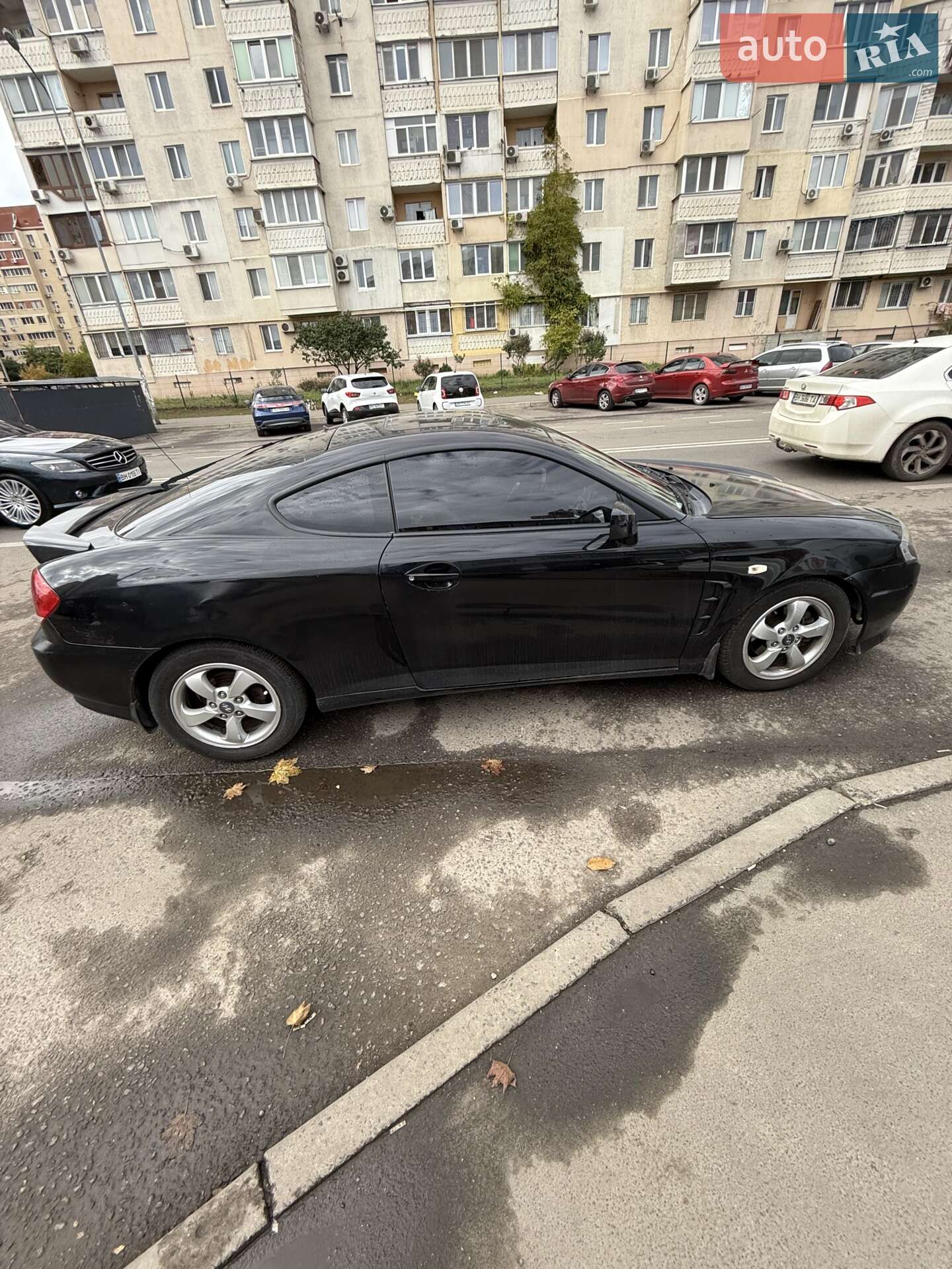 Головне фото звіту автомобіля HYUNDAI COUPE 2006
