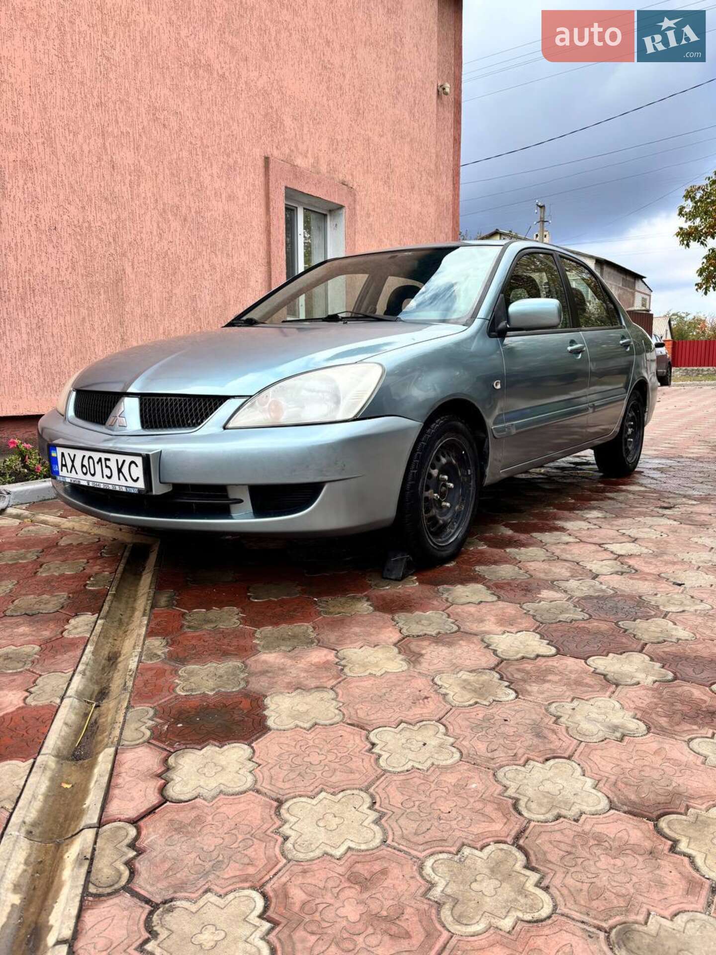 Головне фото звіту автомобіля MITSUBISHI LANCER 2008
