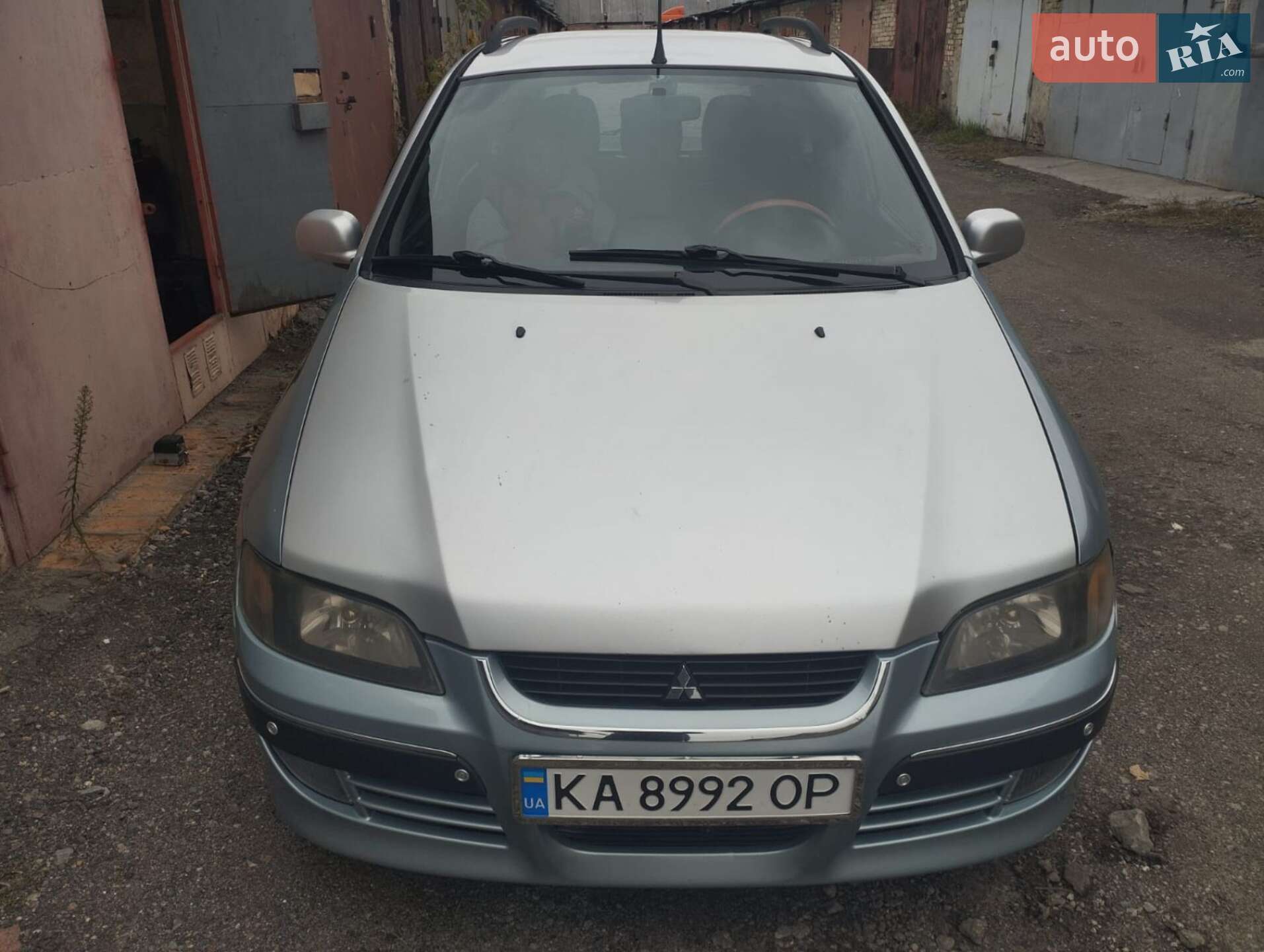 Головне фото звіту автомобіля MITSUBISHI SPACE STAR 2004