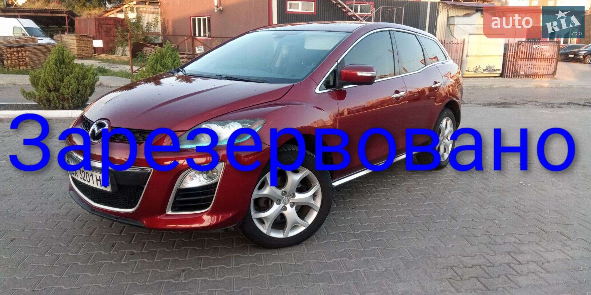 Головне фото звіту автомобіля MAZDA CX-7 2009