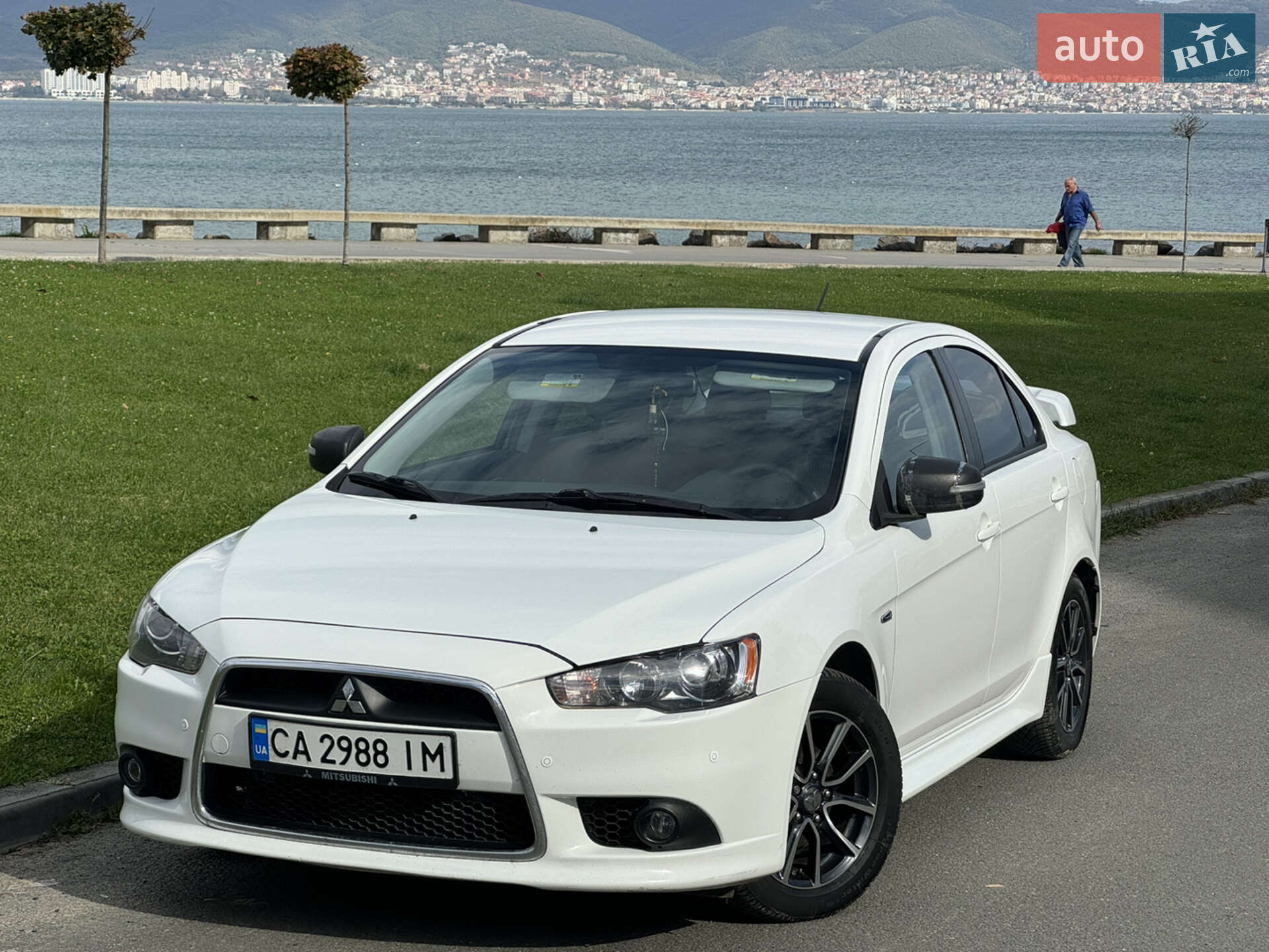 Головне фото звіту автомобіля MITSUBISHI LANCER 2015
