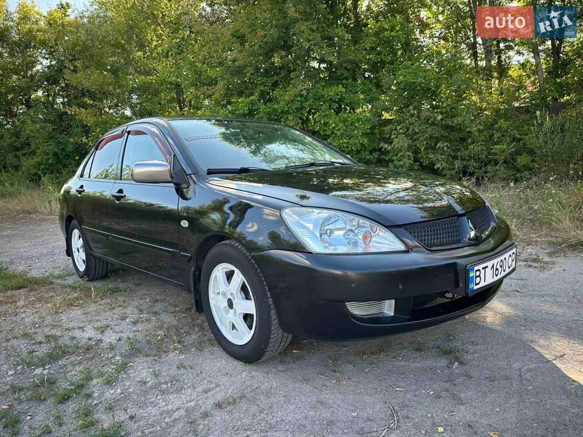Головне фото звіту автомобіля MITSUBISHI LANCER 2006