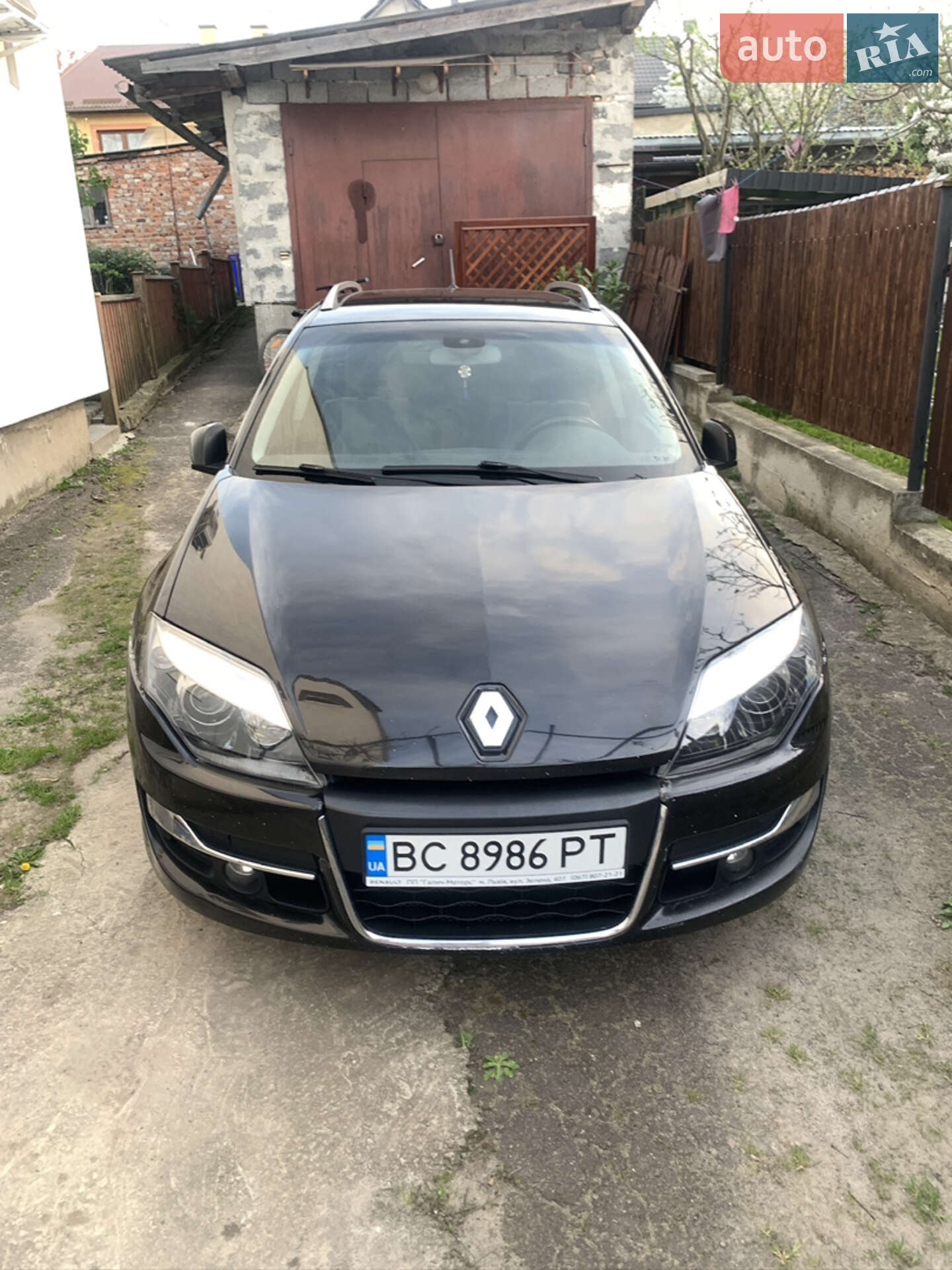 Головне фото звіту автомобіля RENAULT LAGUNA 2011