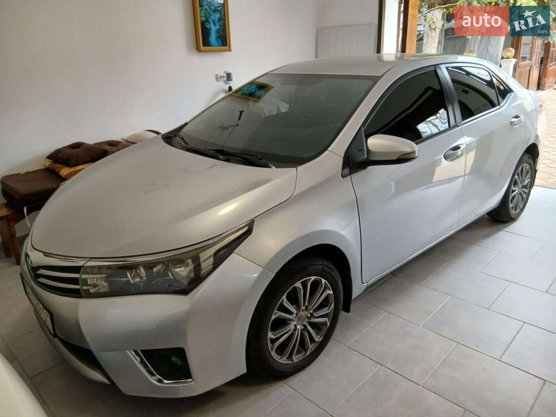 Головне фото звіту автомобіля TOYOTA COROLLA 2014