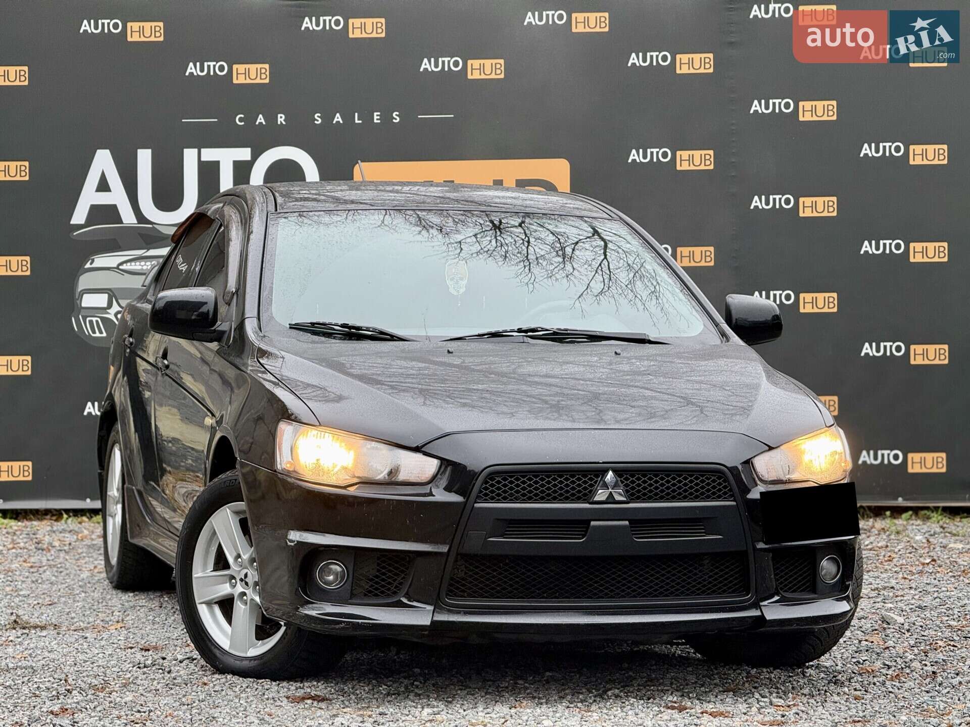 Головне фото звіту автомобіля MITSUBISHI LANCER 2008