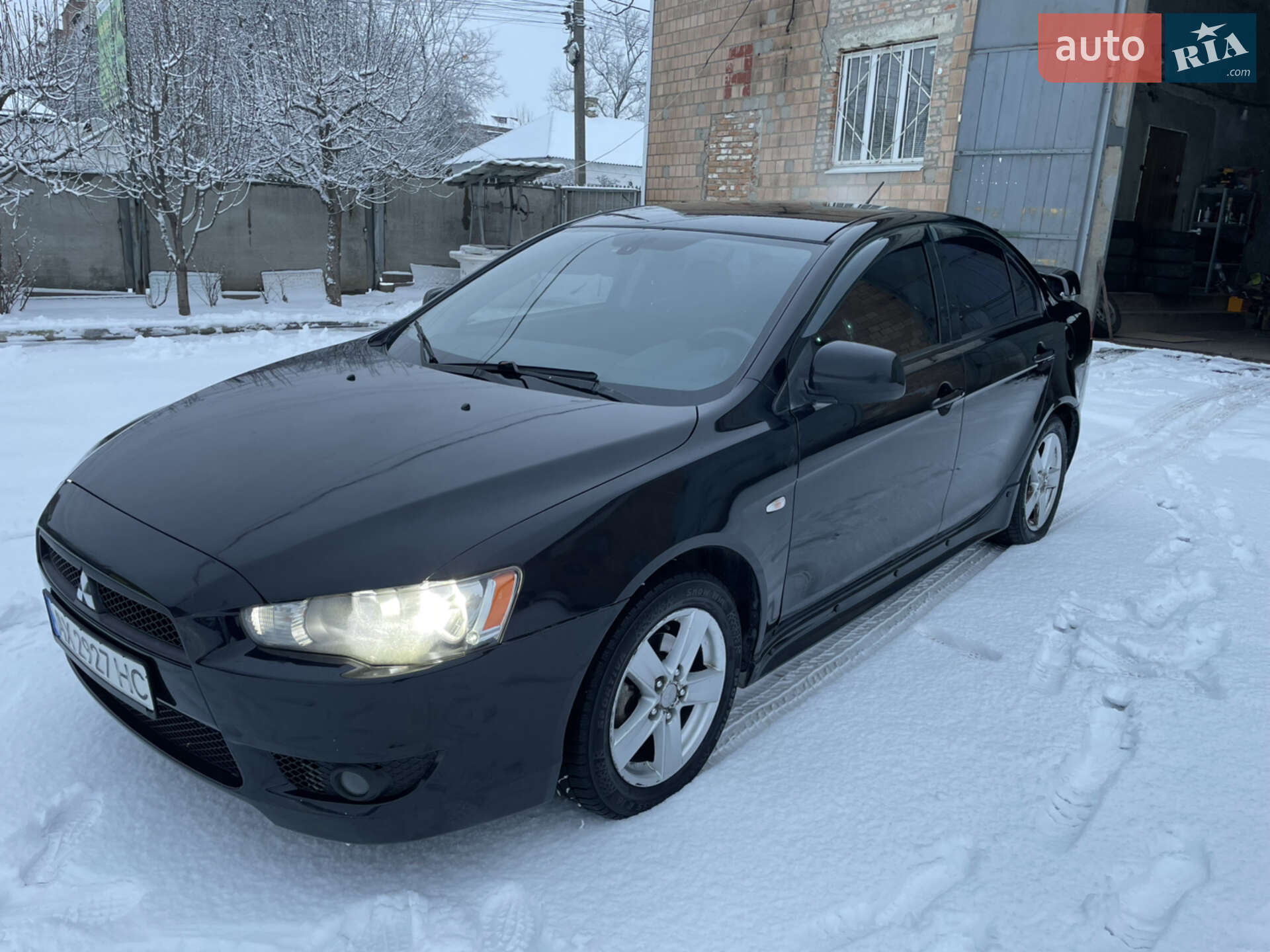 Головне фото звіту автомобіля MITSUBISHI LANCER 2008