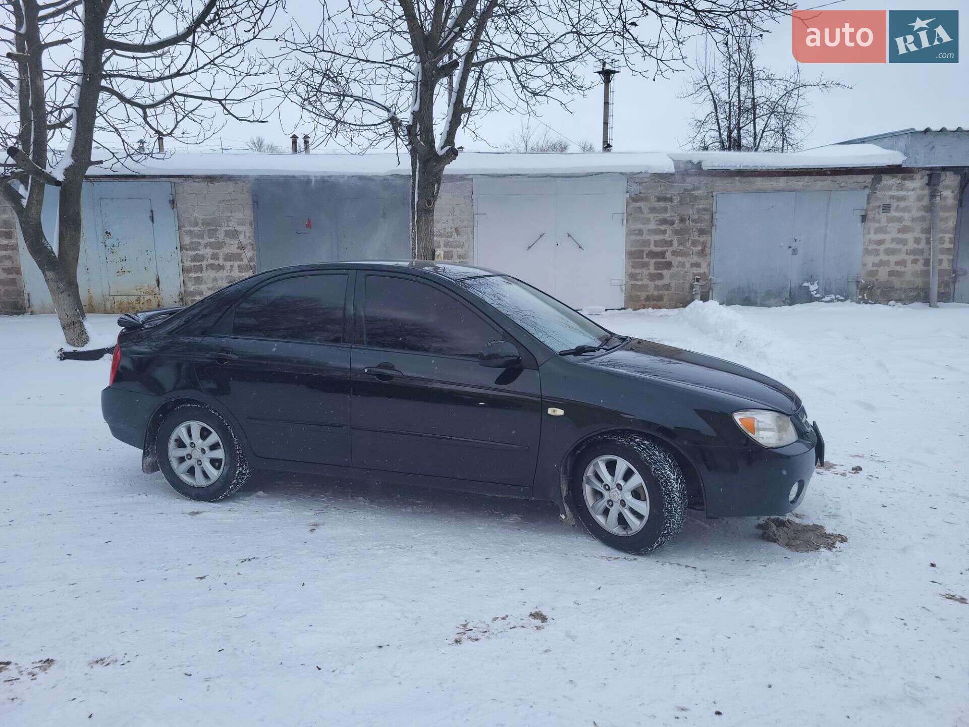 Головне фото звіту автомобіля KIA CERATO 2006