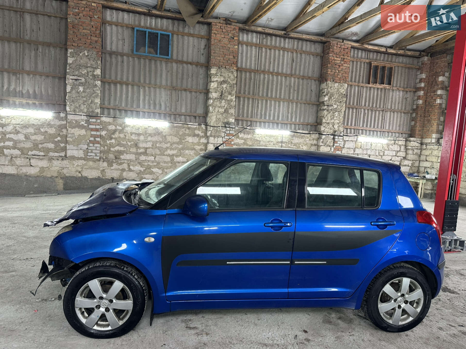 Головне фото звіту автомобіля SUZUKI SWIFT 2009