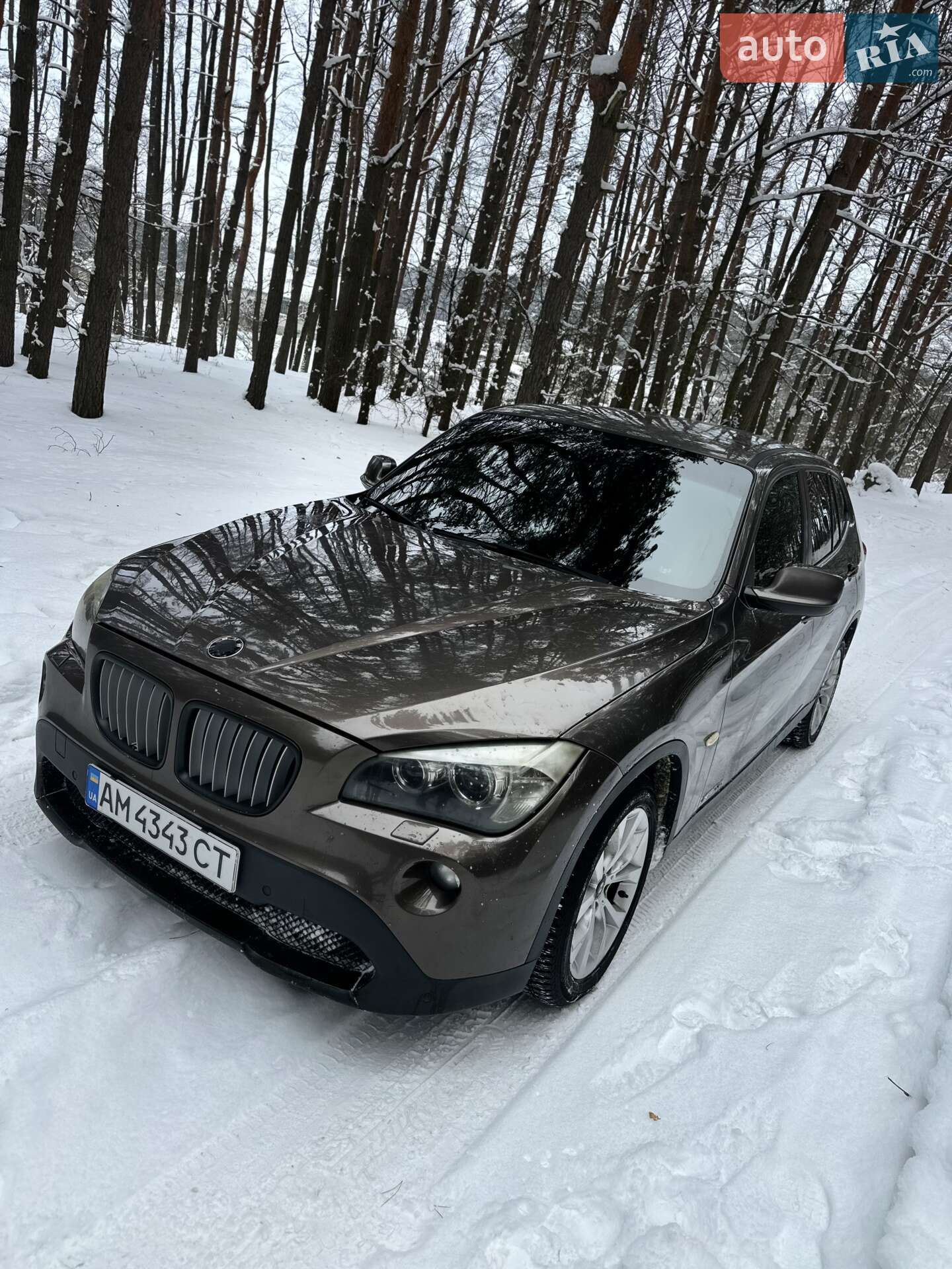 Головне фото звіту автомобіля BMW X1 2010