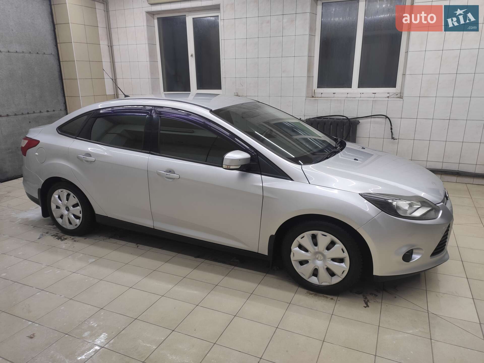 Головне фото звіту автомобіля FORD FOCUS 2011