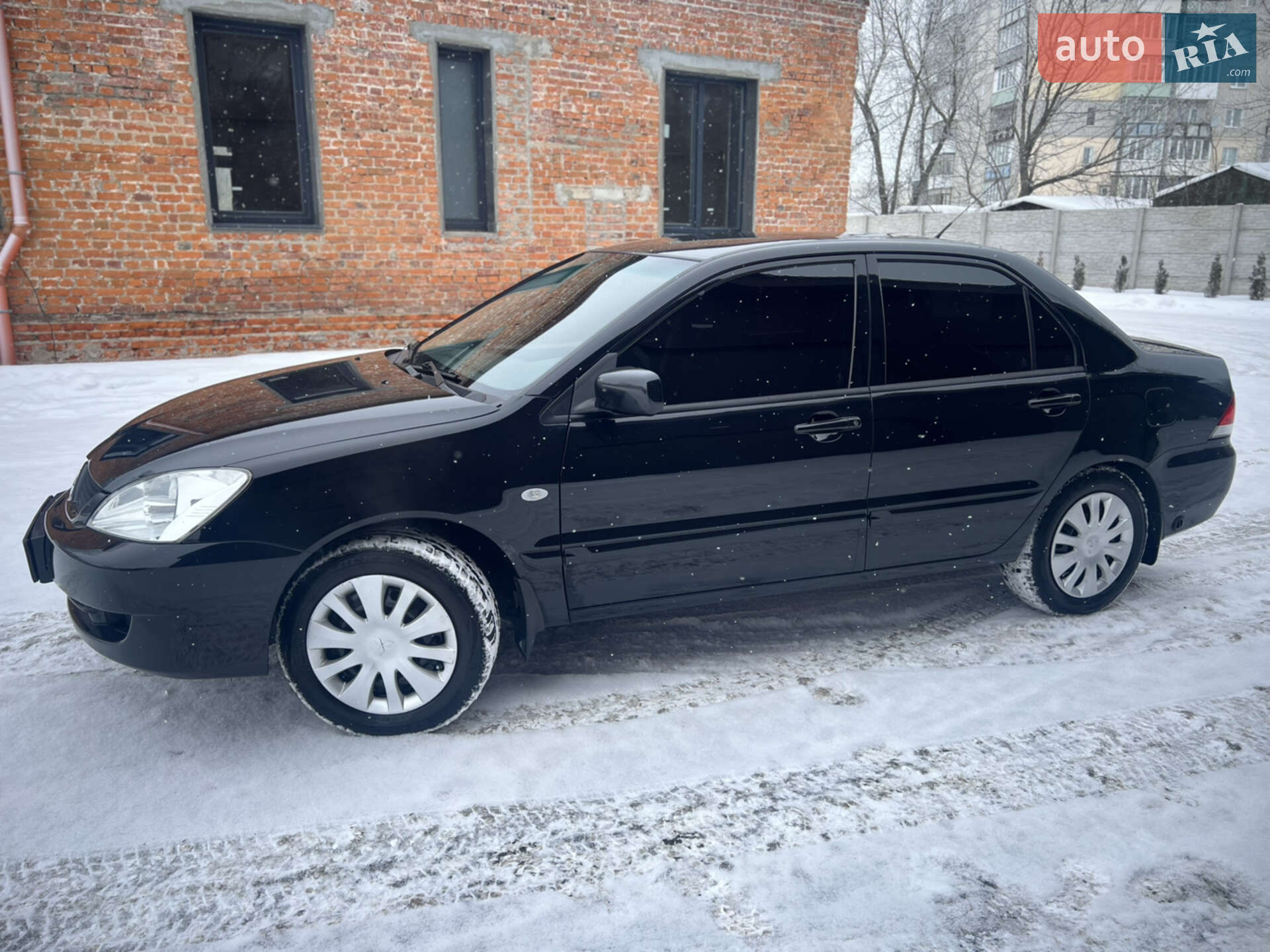 Головне фото звіту автомобіля MITSUBISHI LANCER 2008