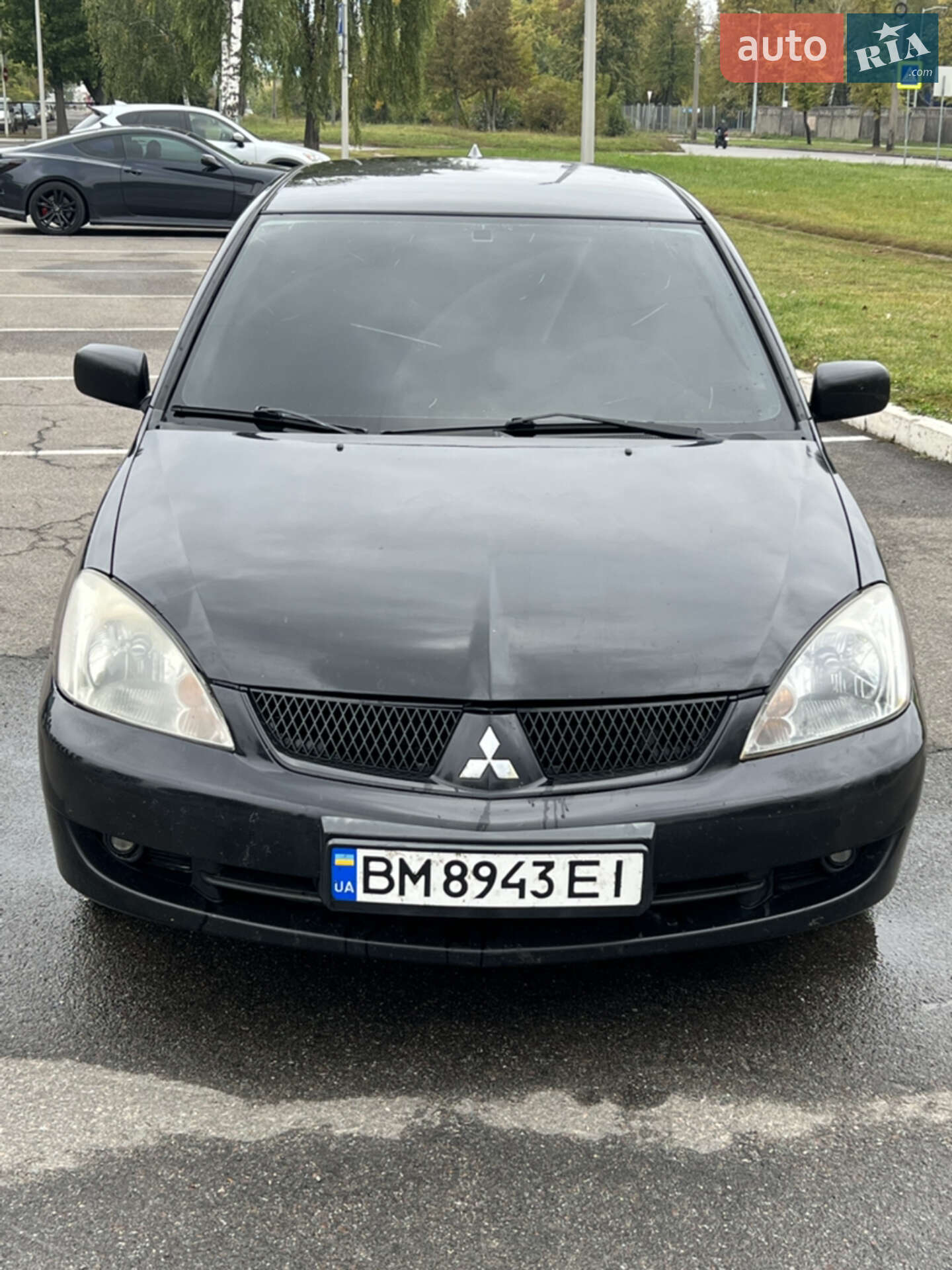 Головне фото звіту автомобіля MITSUBISHI LANCER 2005