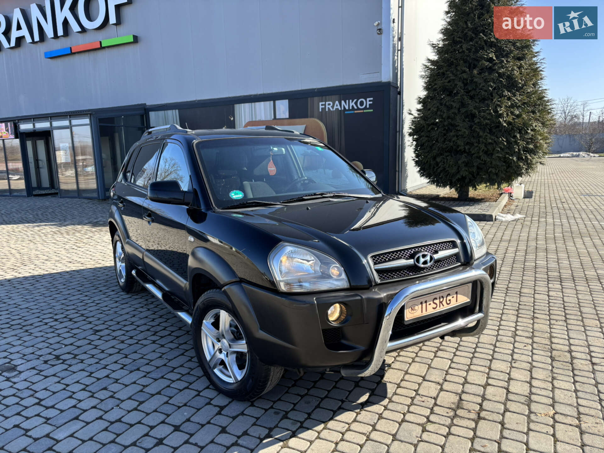 Головне фото звіту автомобіля HYUNDAI TUCSON 2006