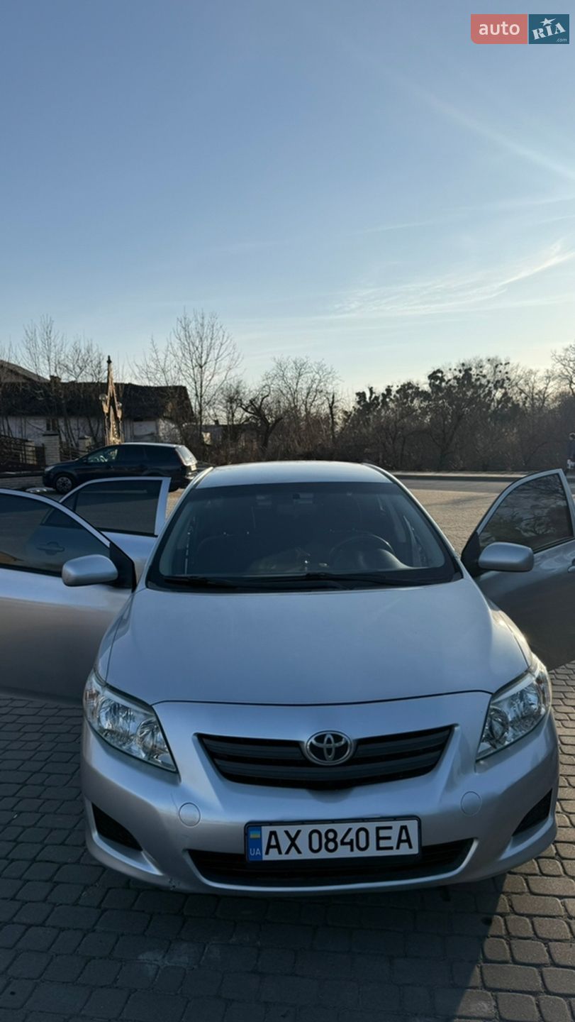 Головне фото звіту автомобіля TOYOTA COROLLA 2009