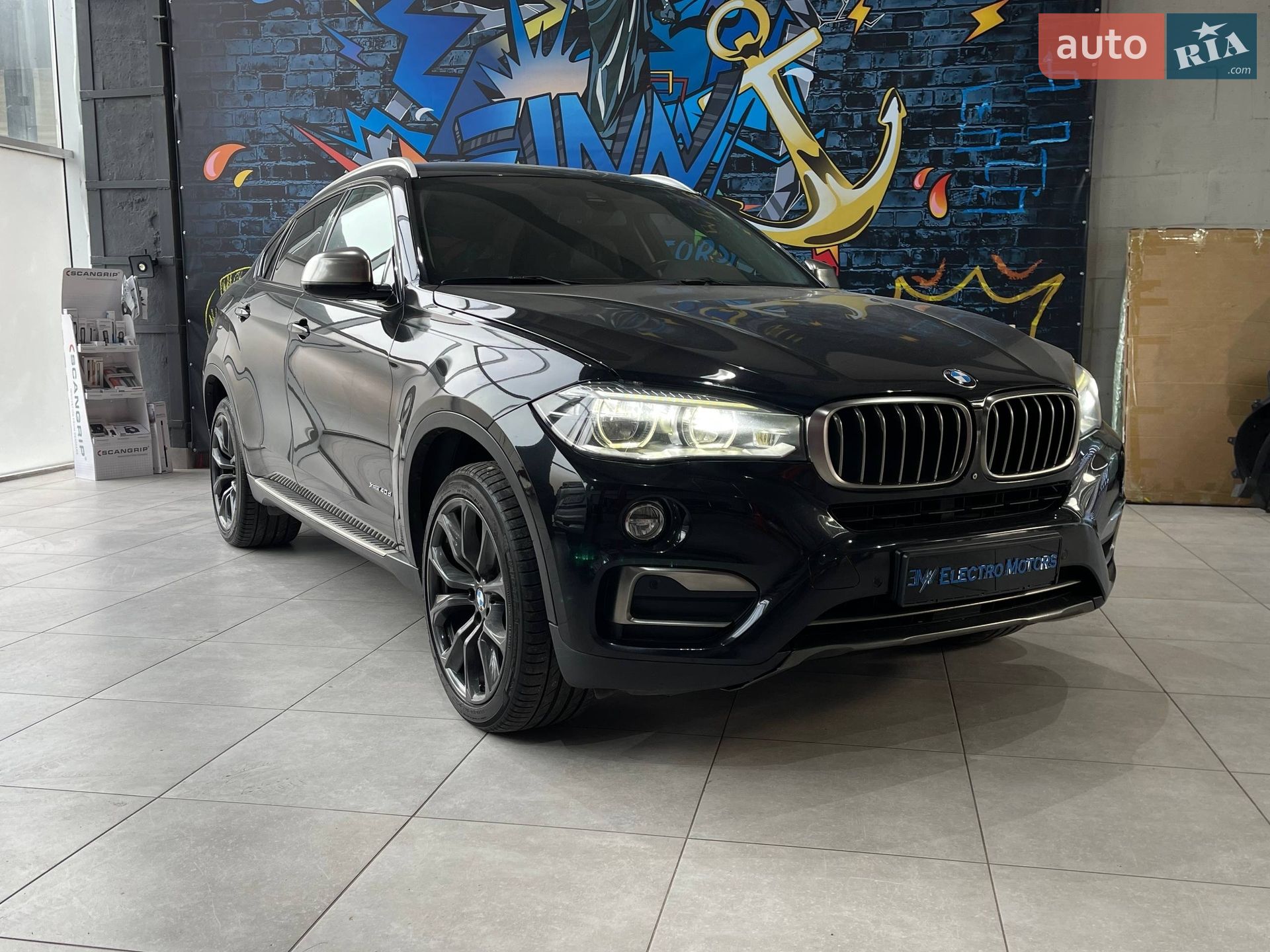 Головне фото звіту автомобіля BMW X6 2014