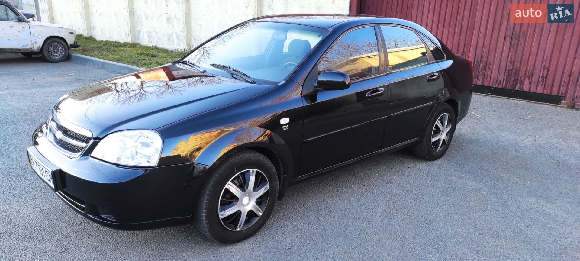 Головне фото звіту автомобіля CHEVROLET LACETTI 2006