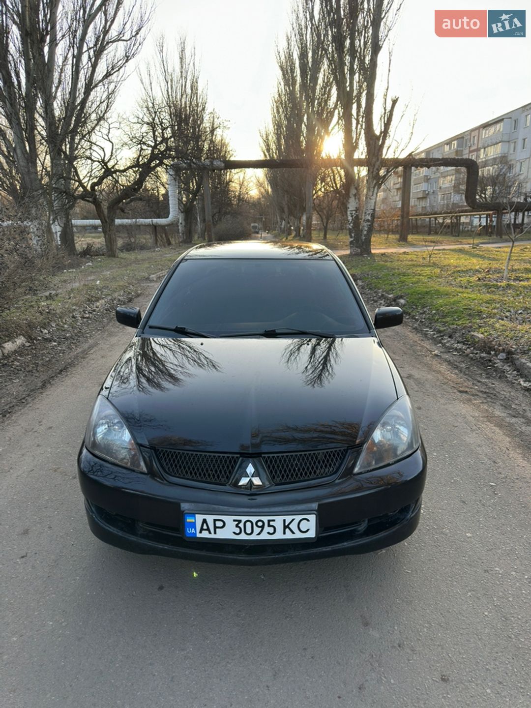 Головне фото звіту автомобіля MITSUBISHI LANCER 2006