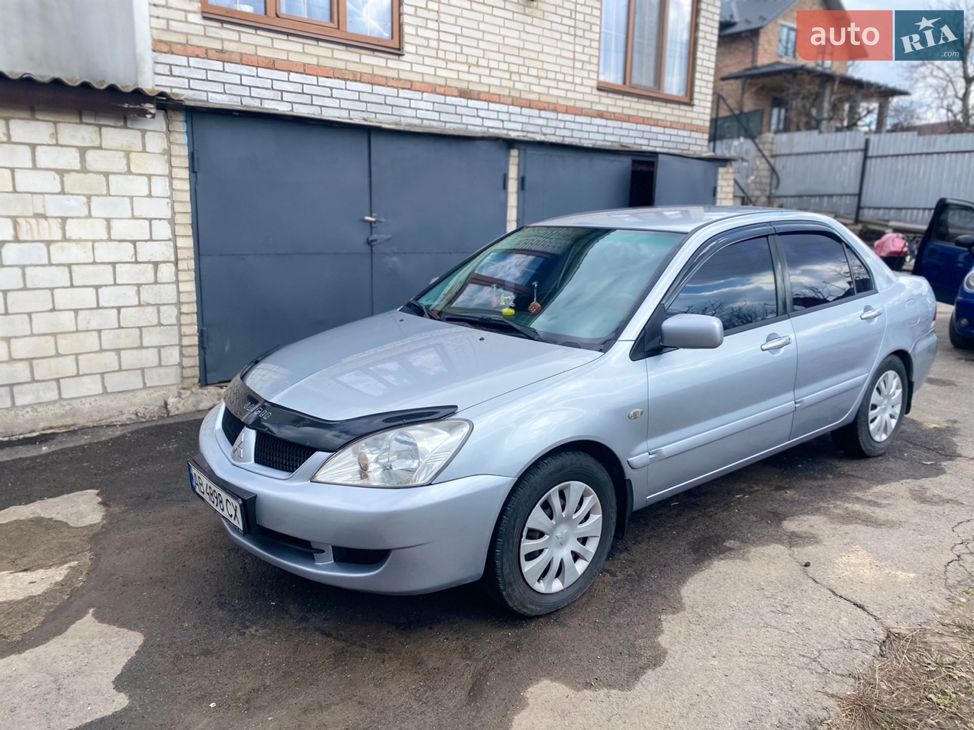 Головне фото звіту автомобіля MITSUBISHI LANCER 2008