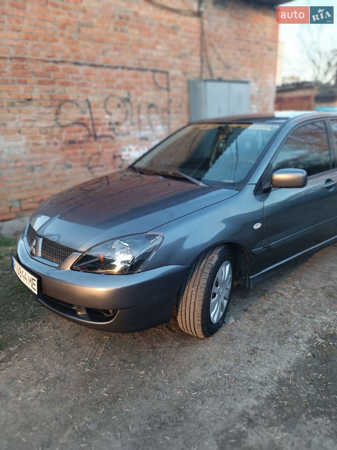 Головне фото звіту автомобіля MITSUBISHI LANCER 2005