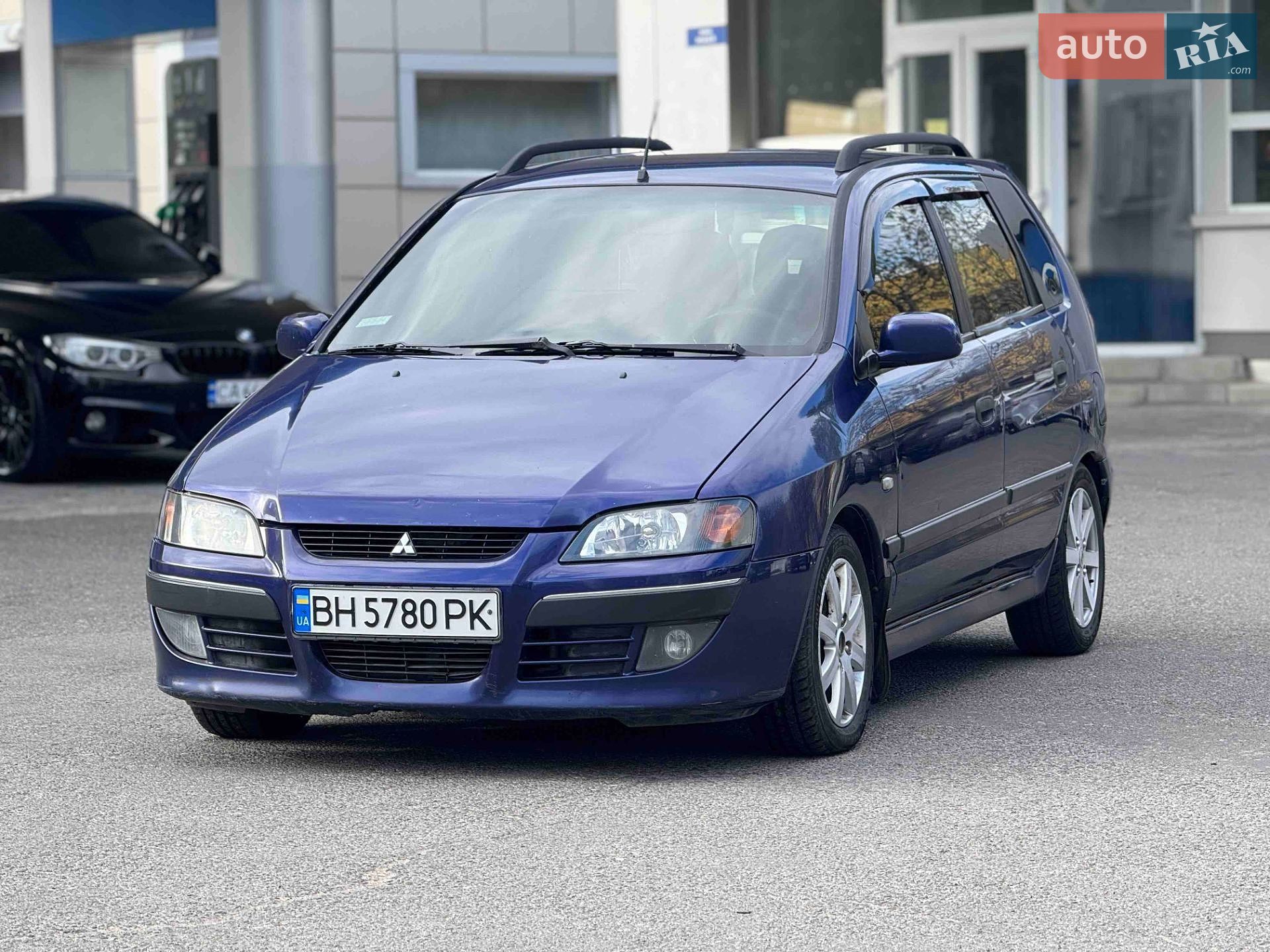 Головне фото звіту автомобіля MITSUBISHI SPACE STAR 2004