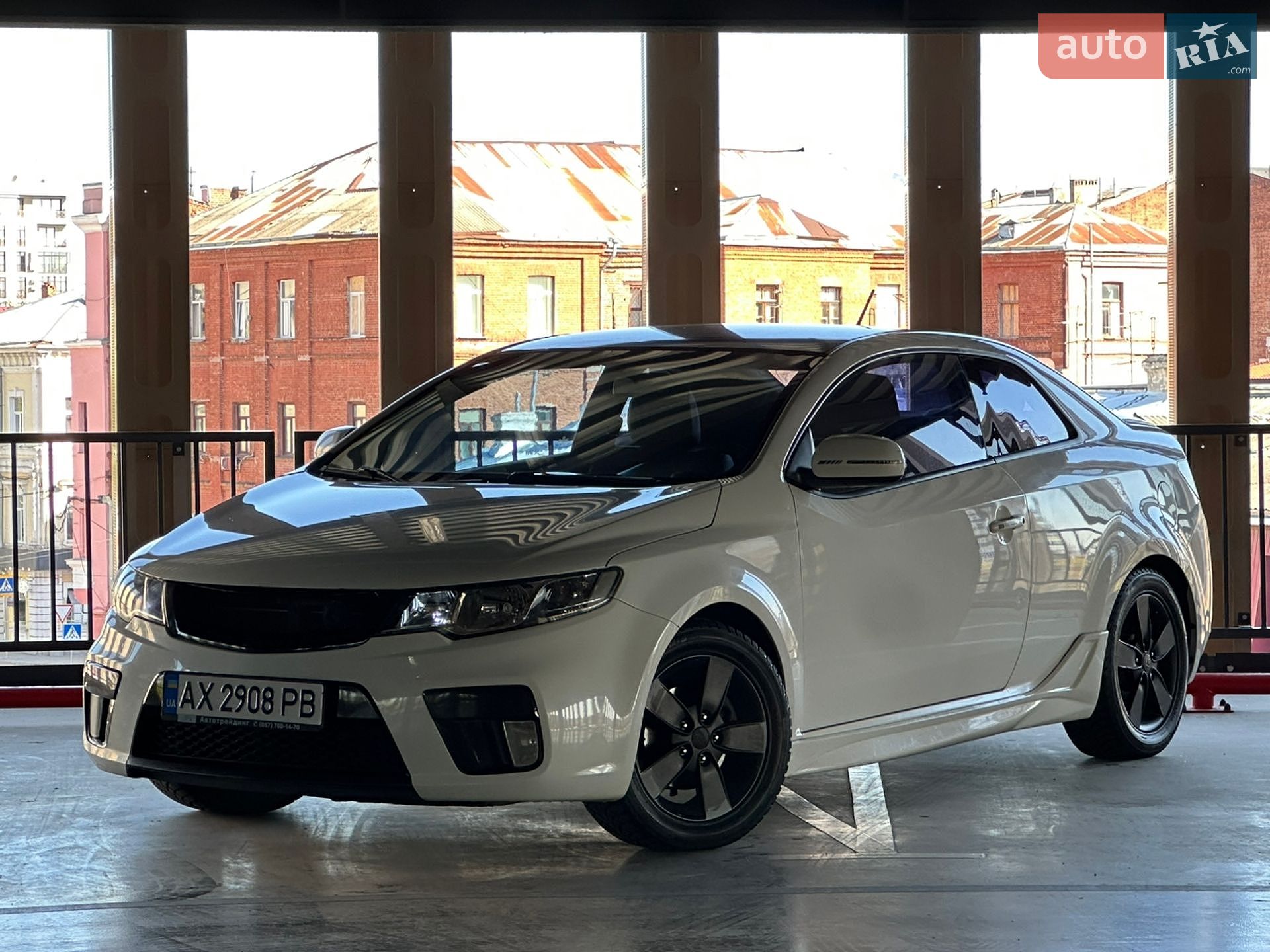 Головне фото звіту автомобіля KIA CERATO 2011