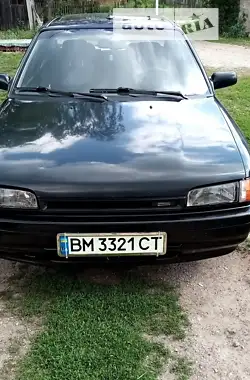 Mazda 323 1991 - пробег 450 тыс. км