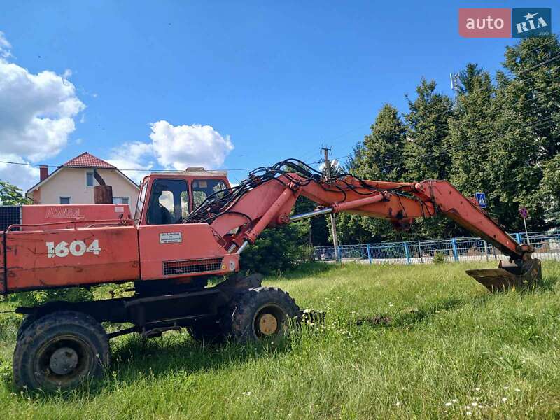 Экскаватор погрузчик Atlas 1604