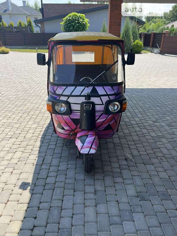 Мото Bajaj RE