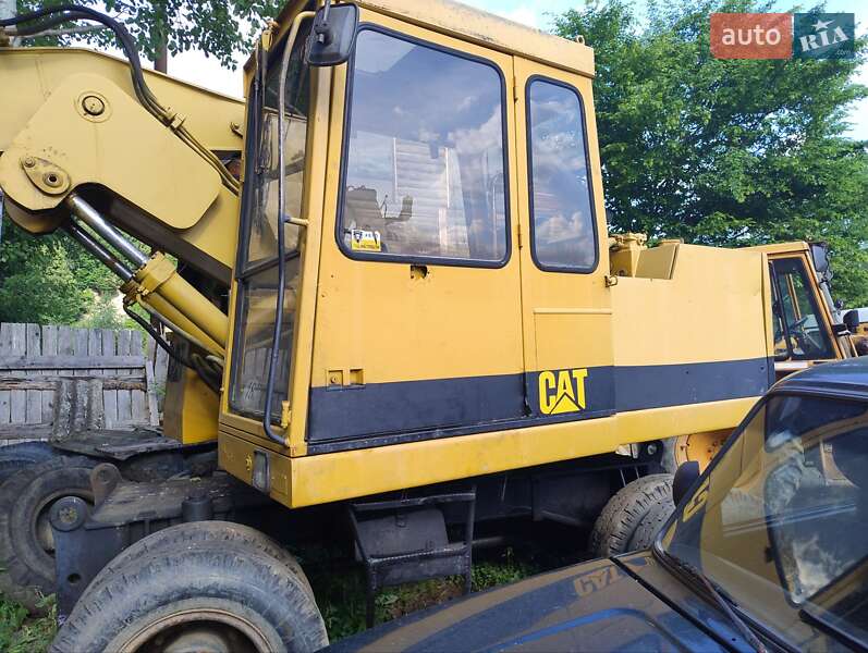 Колісний екскаватор Caterpillar 206