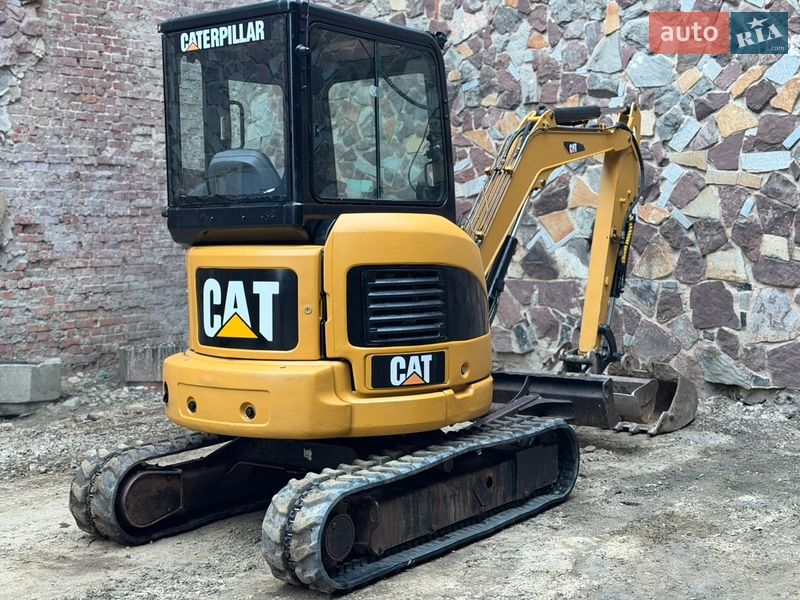 Миниэкскаватор Caterpillar 303