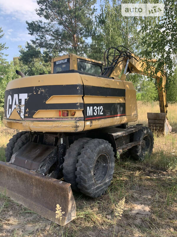 Колесный экскаватор Caterpillar 312