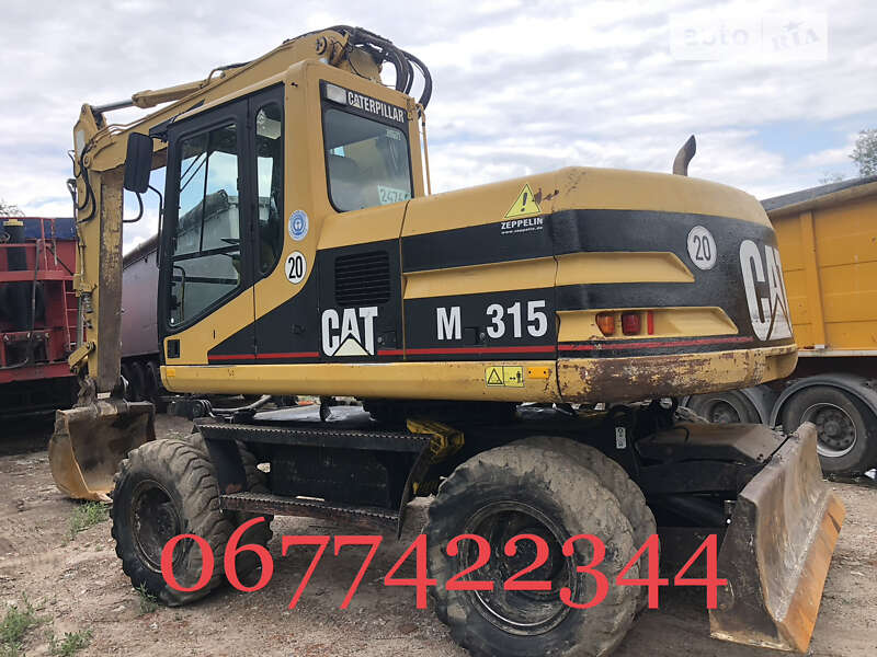 Колісний екскаватор Caterpillar 315