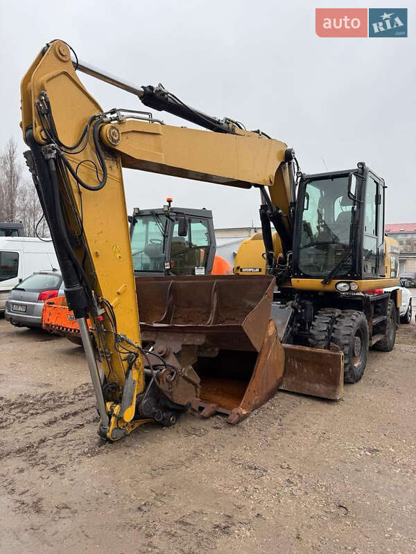 Колісний екскаватор Caterpillar 315
