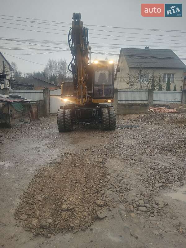 Екскаватор навантажувач Caterpillar 315